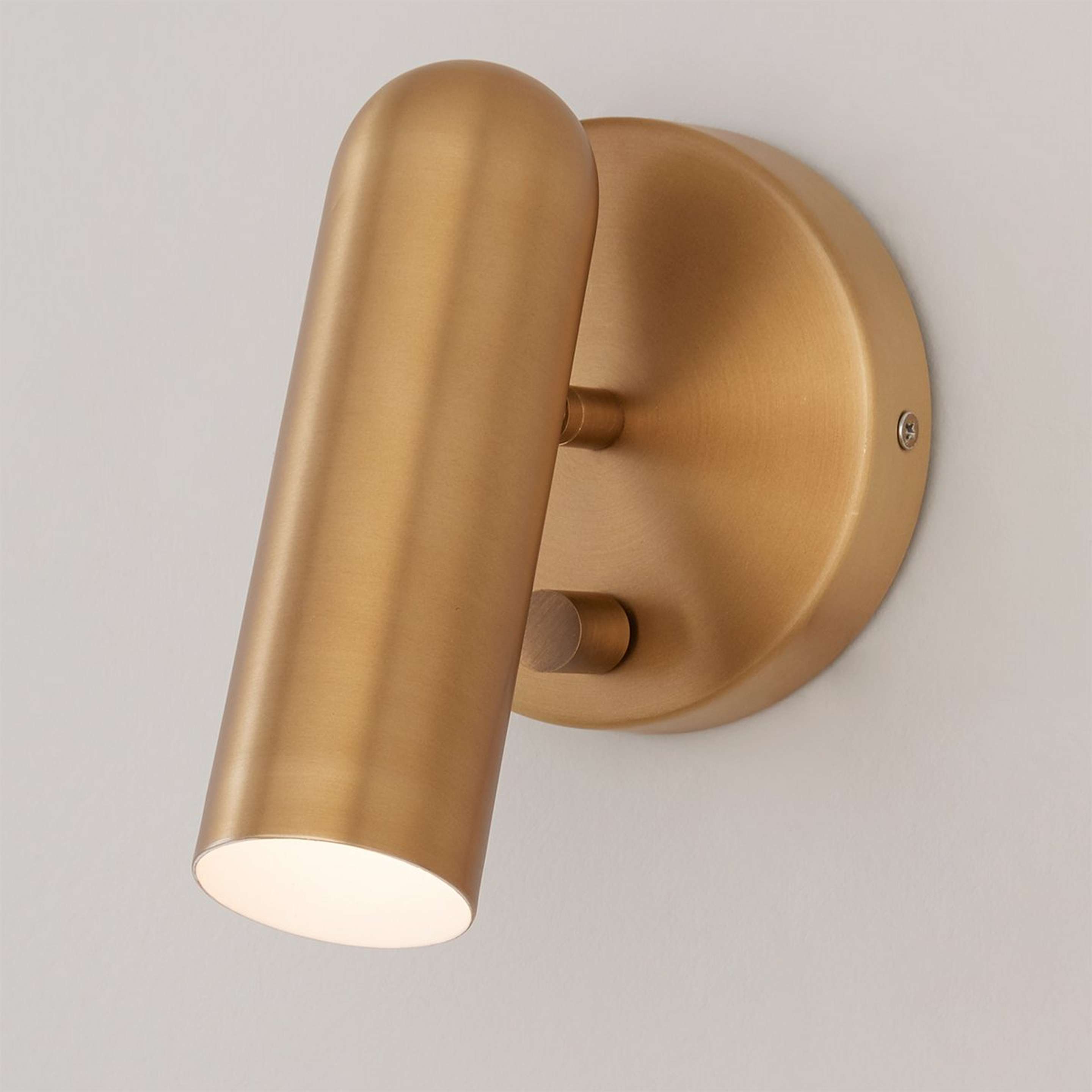 A Slim Spotlight LED Swing Arm Sconce with Antique Brass color
