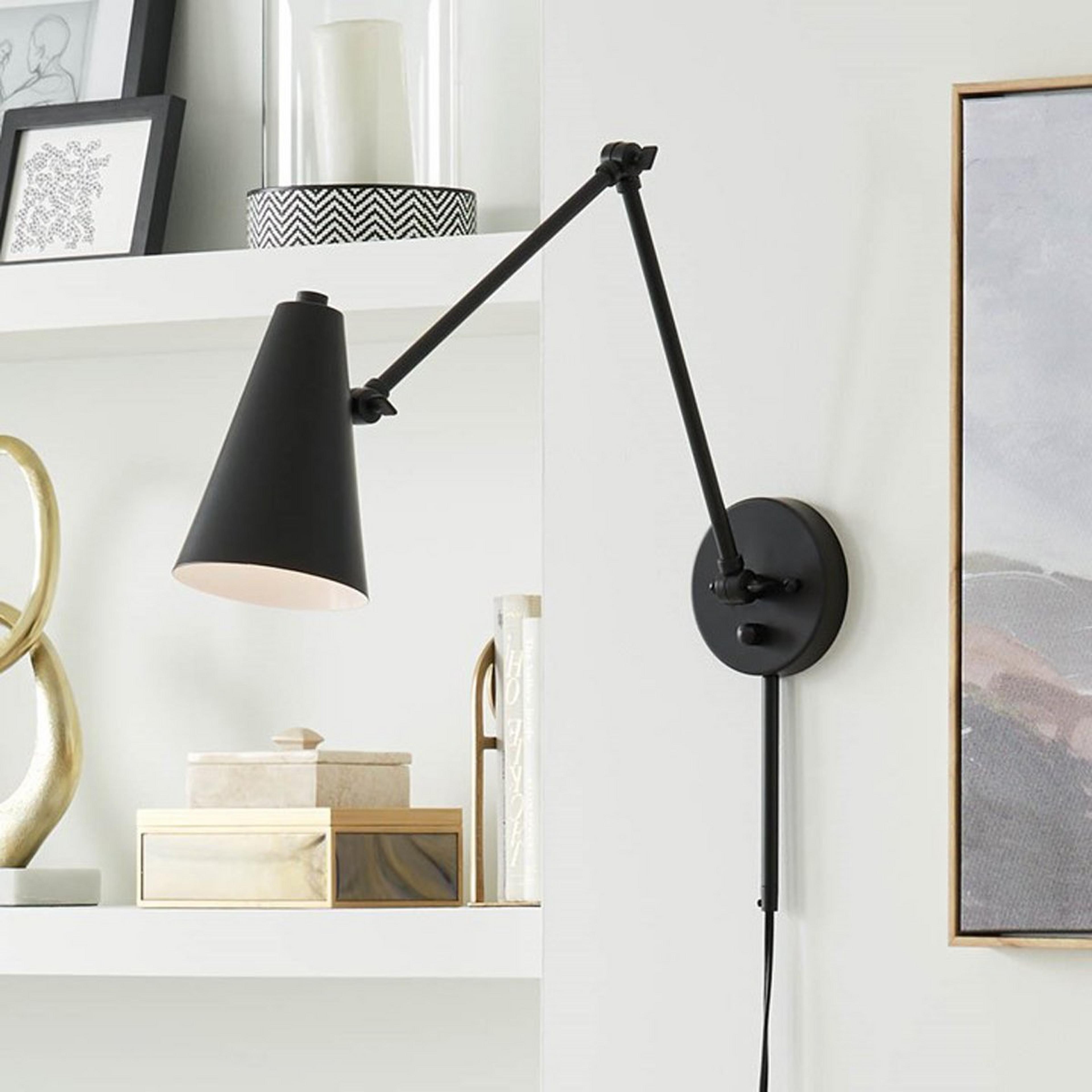 A Desai Arched Swing Arm Sconce with Black color