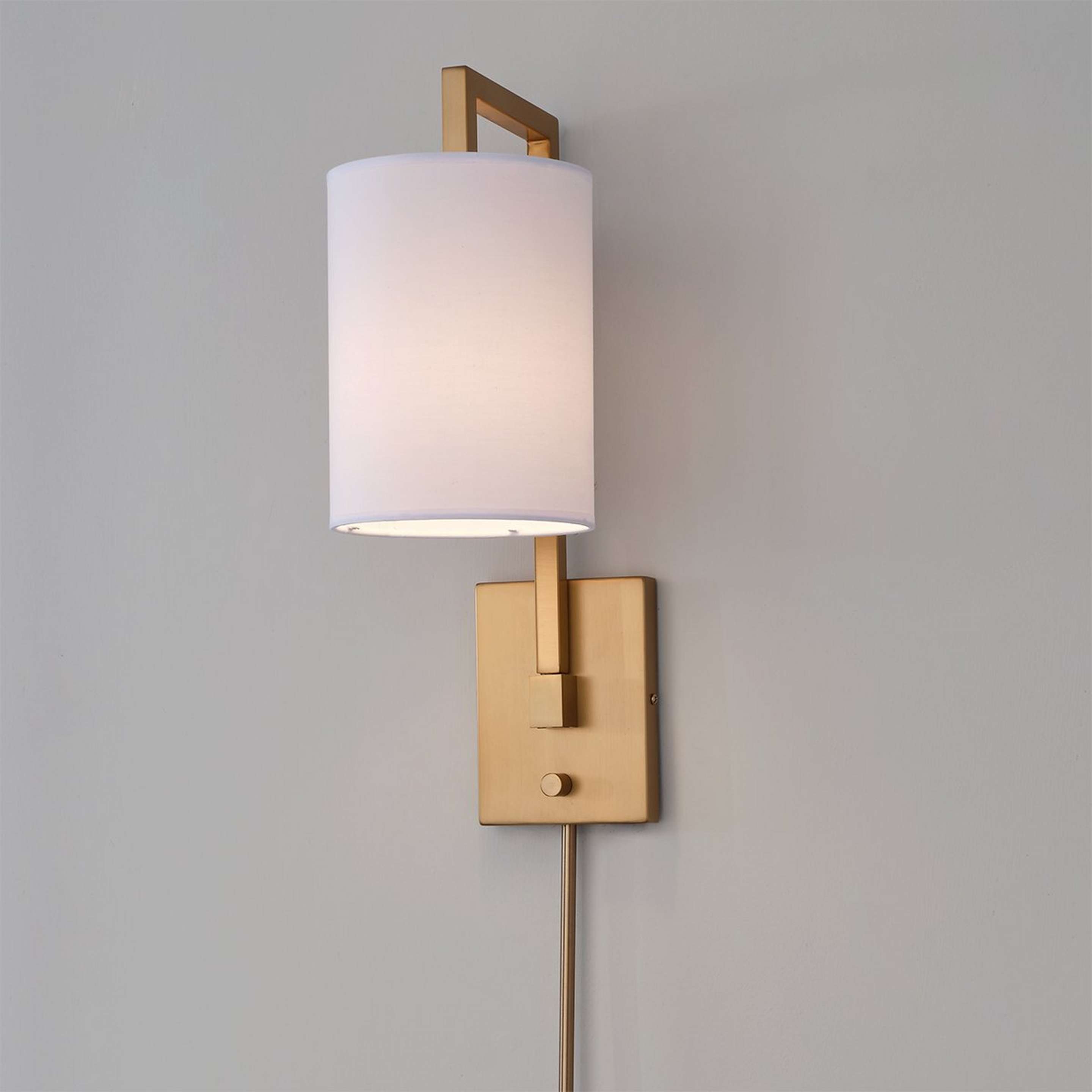 A Selby Swing Arm Wall Sconce with Aged Brass / White color