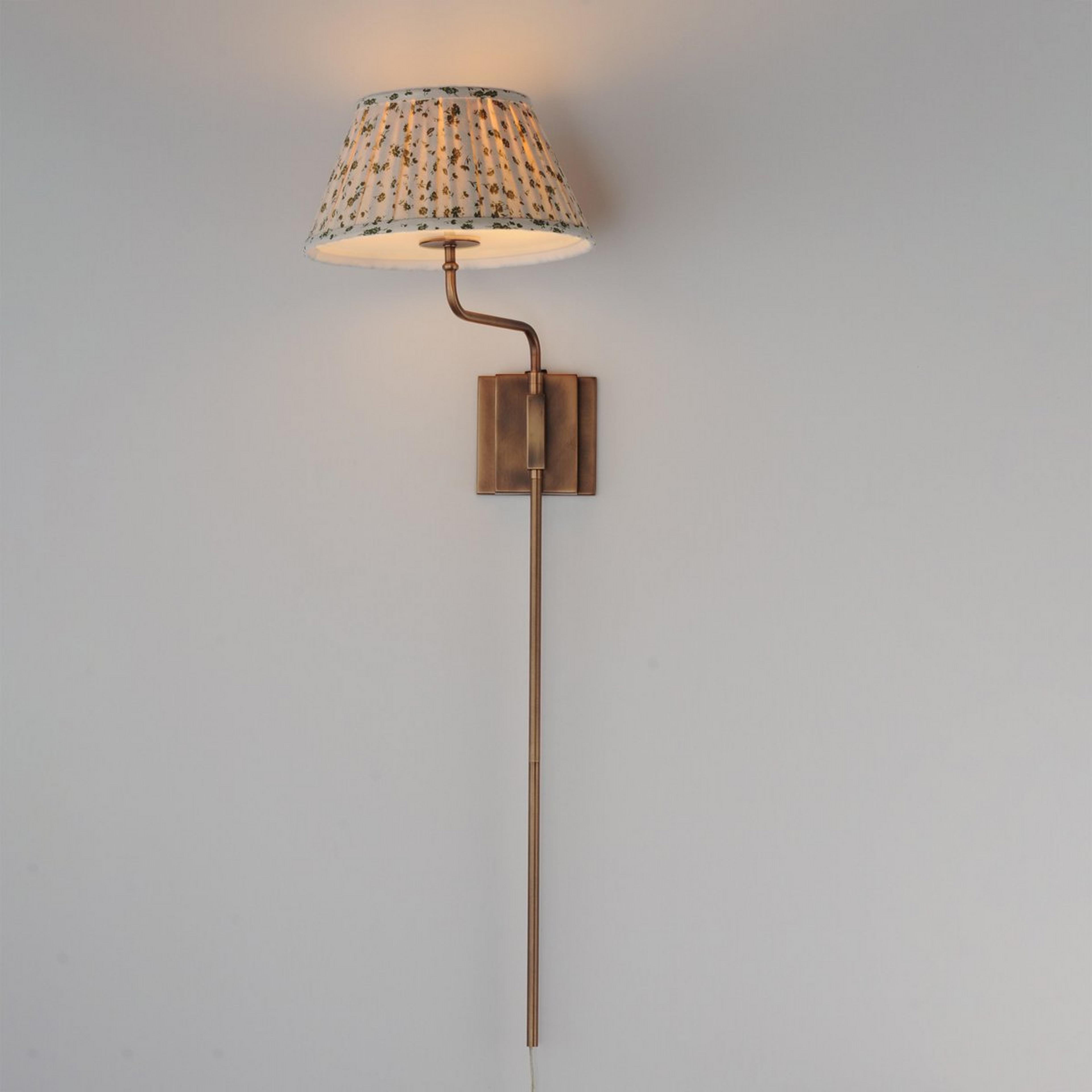 A Dezzie Plug-In Swing Arm Sconce with Brass / Green / White color