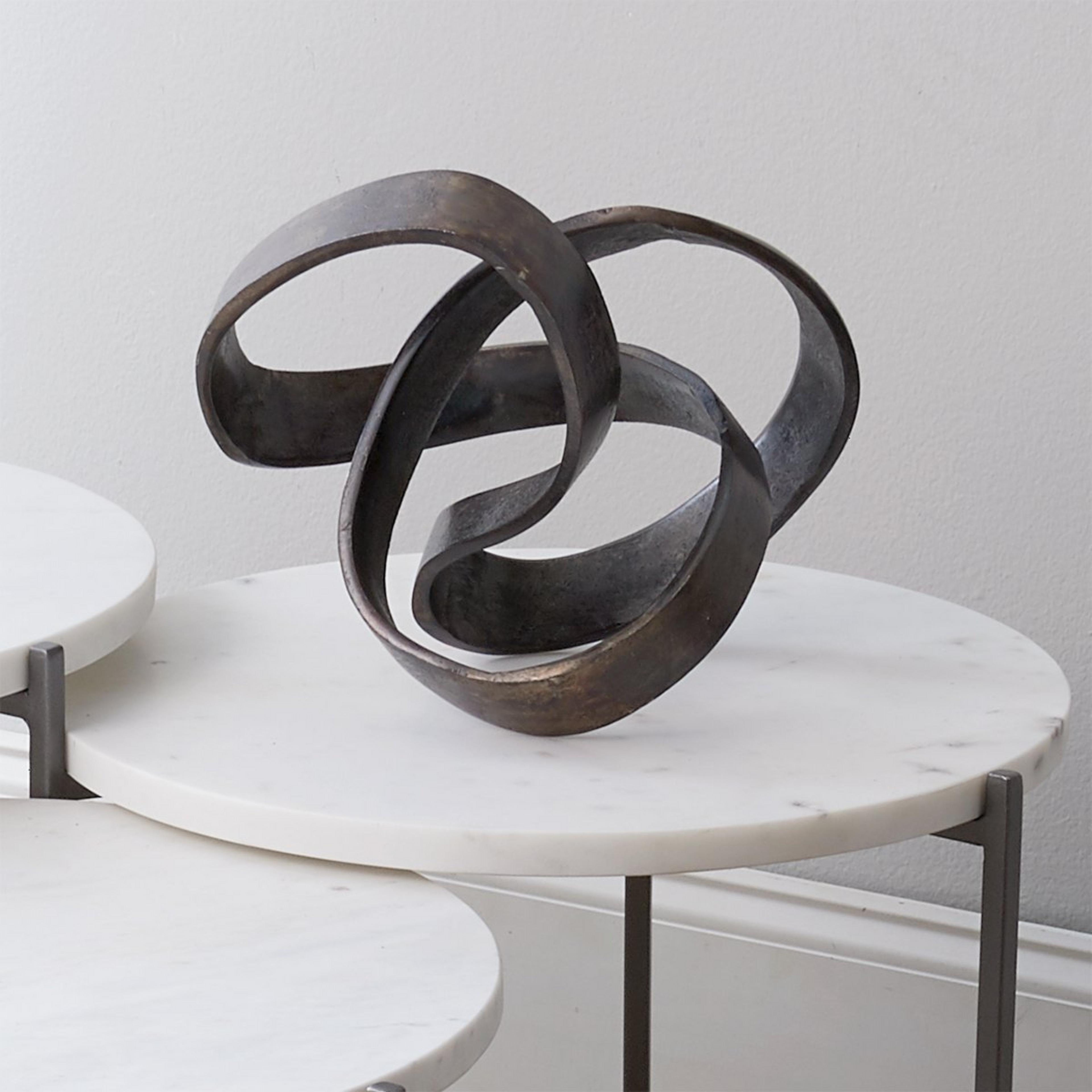 A Contemporaine Sculpture with Darkened Iron color