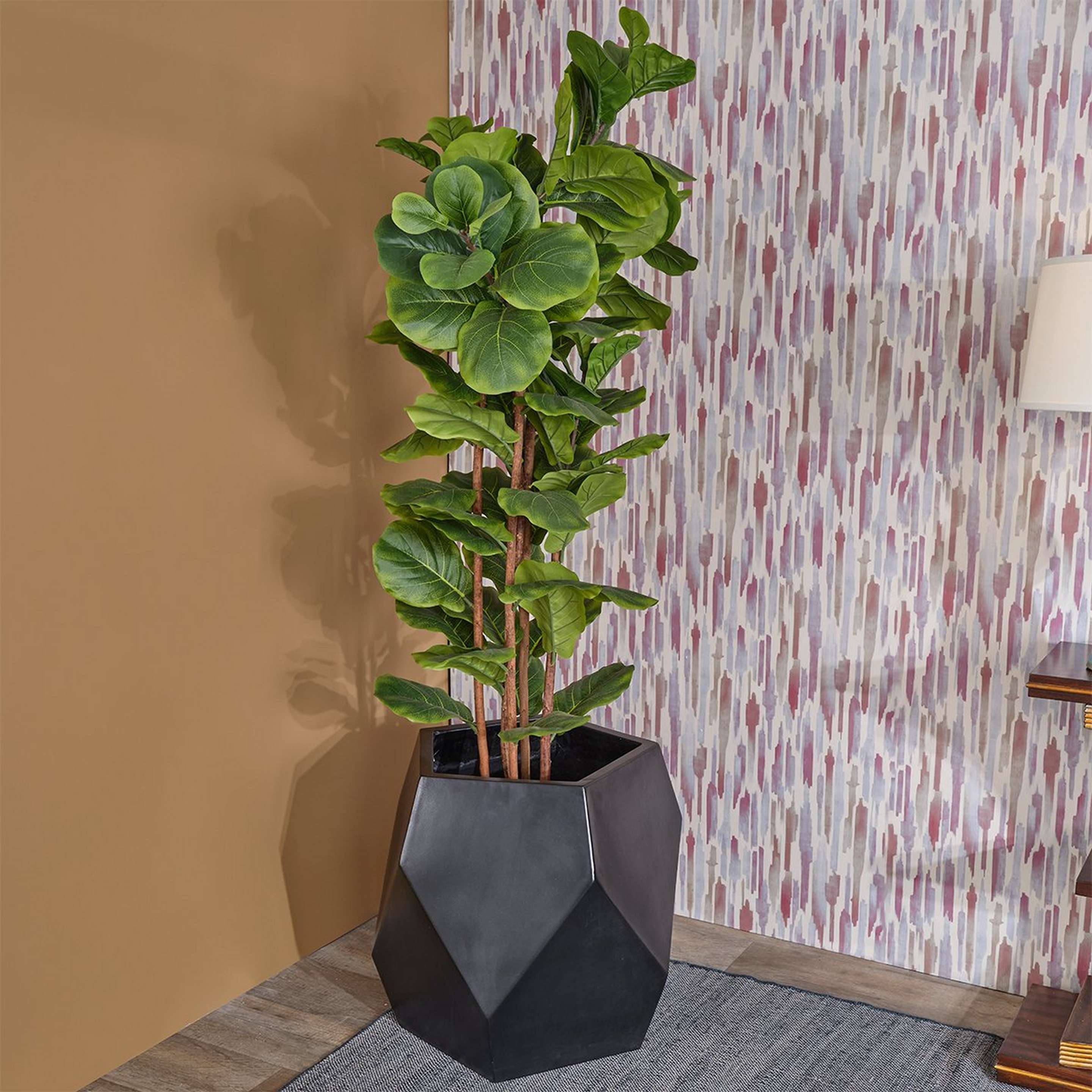 A Piedra Planter with Black Cement color