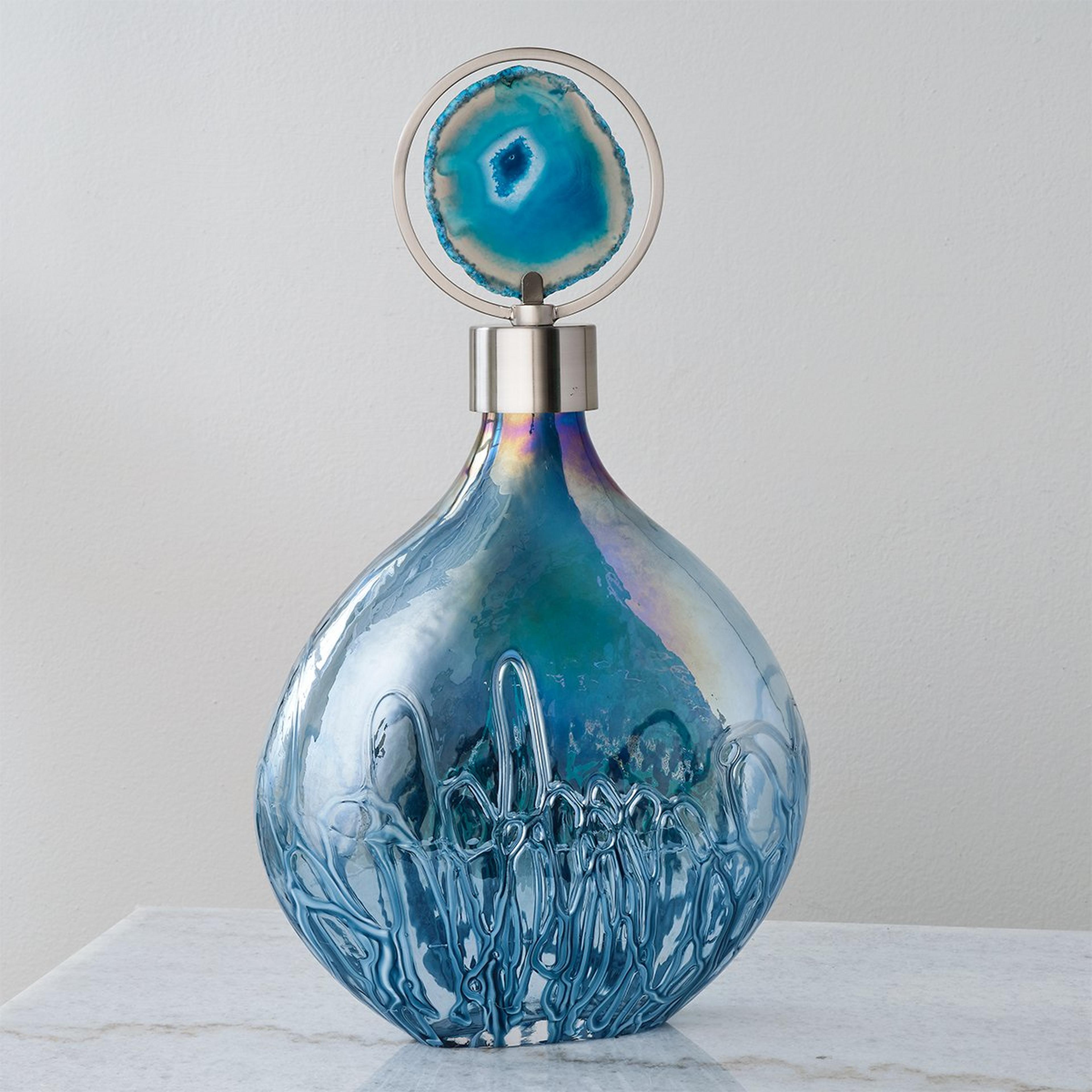 A Calona Bottle with Blue Glass / Blue Agate  color