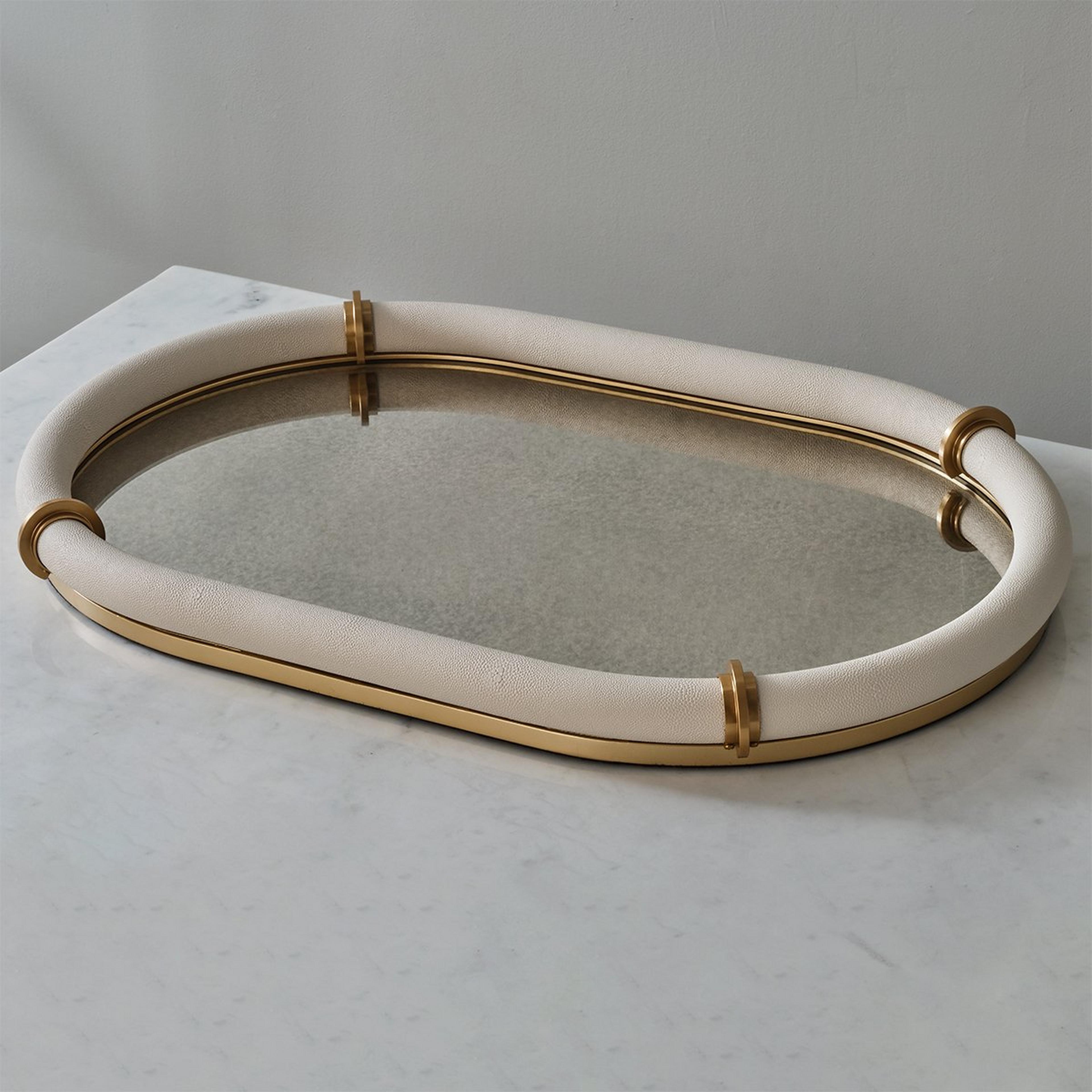 A Yeni Tray with White / Brass / Mirror color