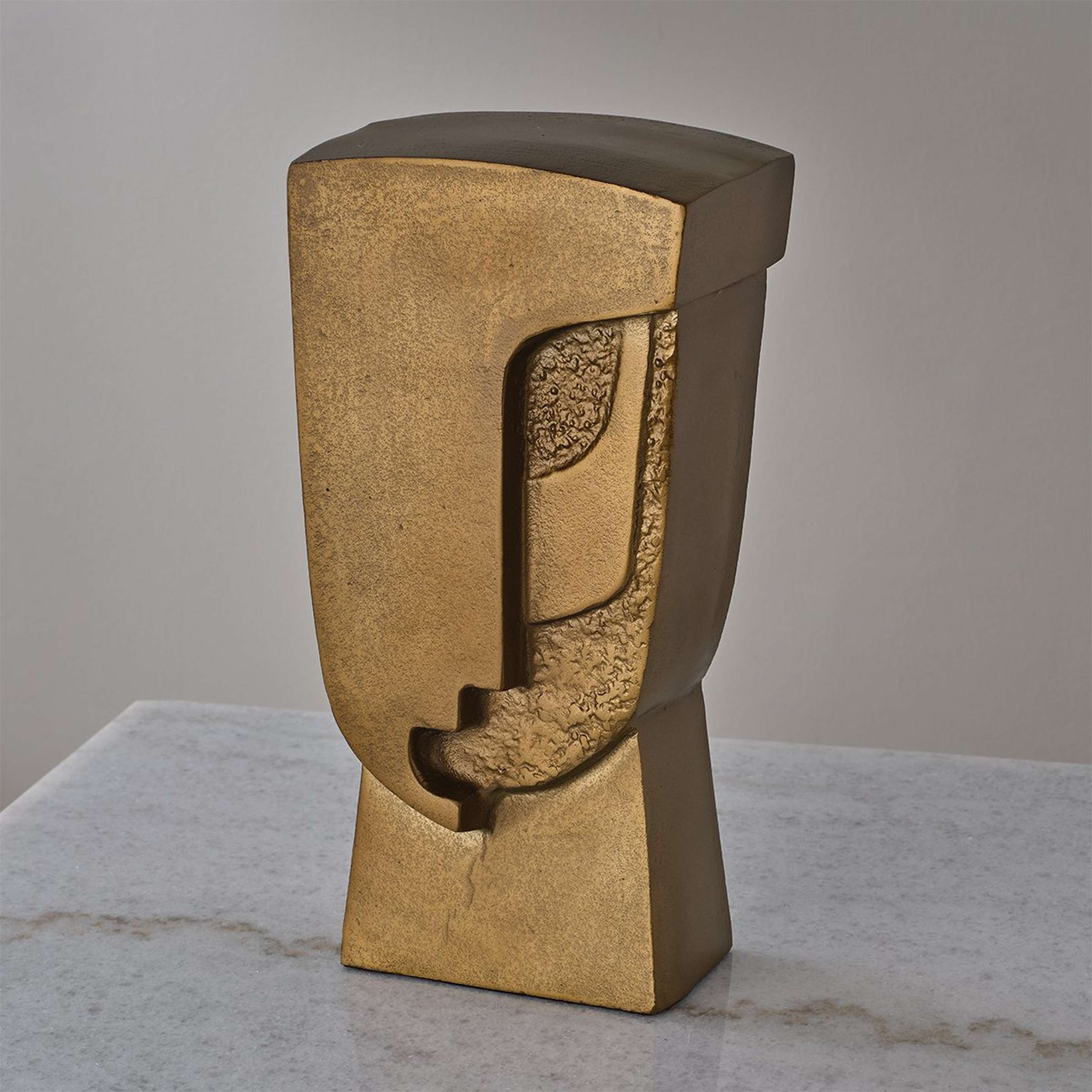 A Norris Sculpture with Antique Brass color