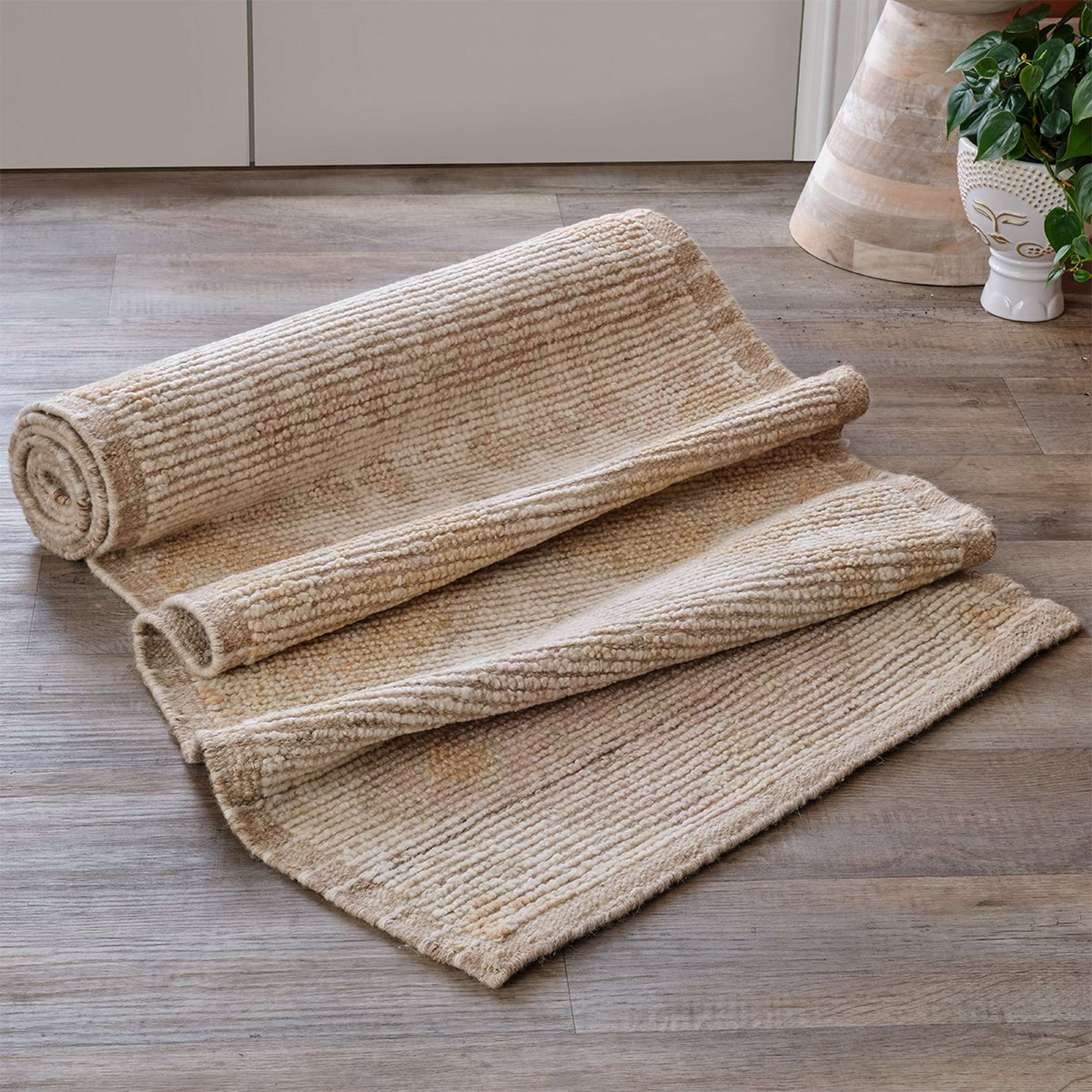 A Petrichor Rug with Cream / Light Brown / Soft Pink / Apricot color