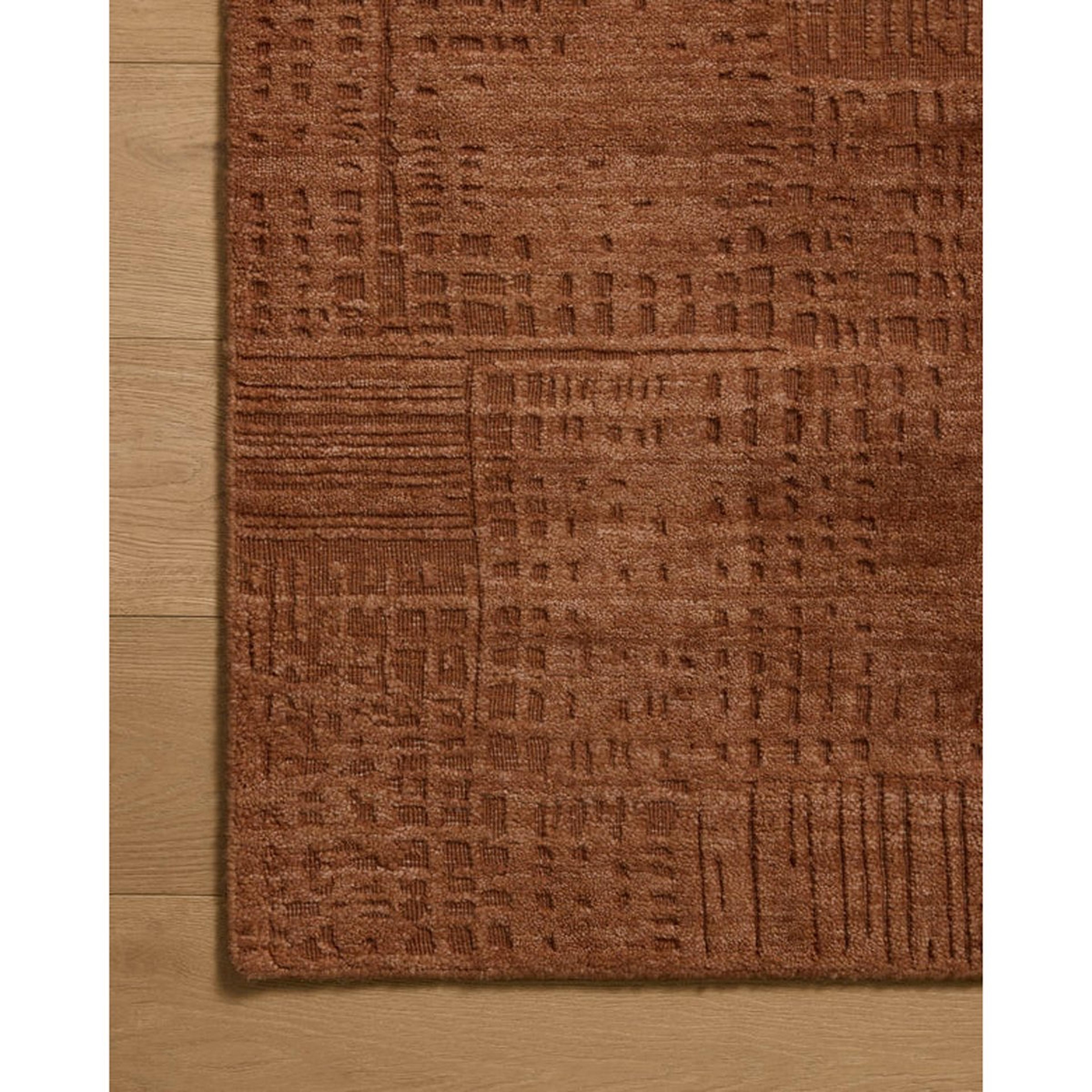 A Landfall Handwoven Rug with Brown color