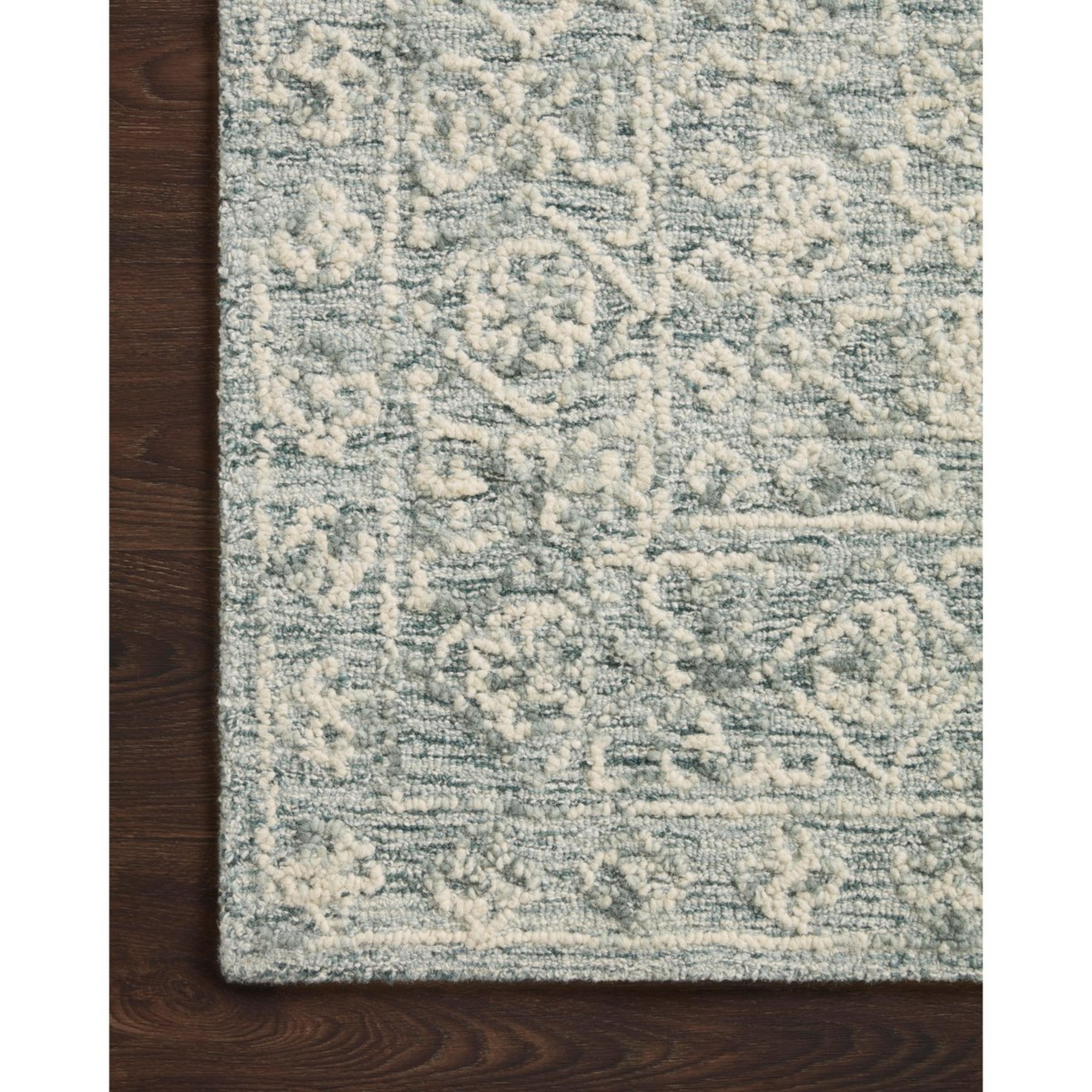 A Roswell Hand-Tufted Rug with Ocean Blue / Ivory color