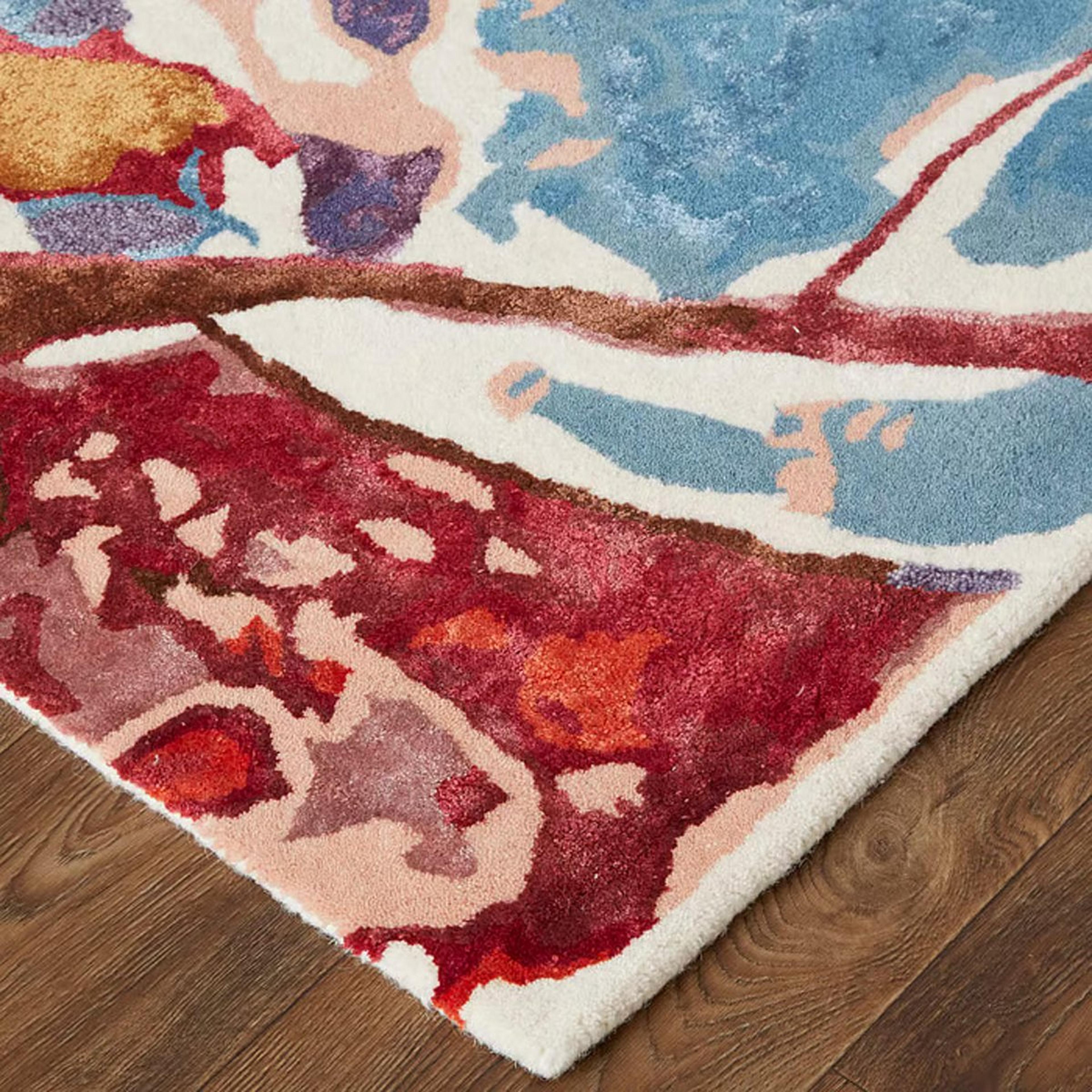A Torrence Hand-Tufted Rug with Red / Purple / Ivory color