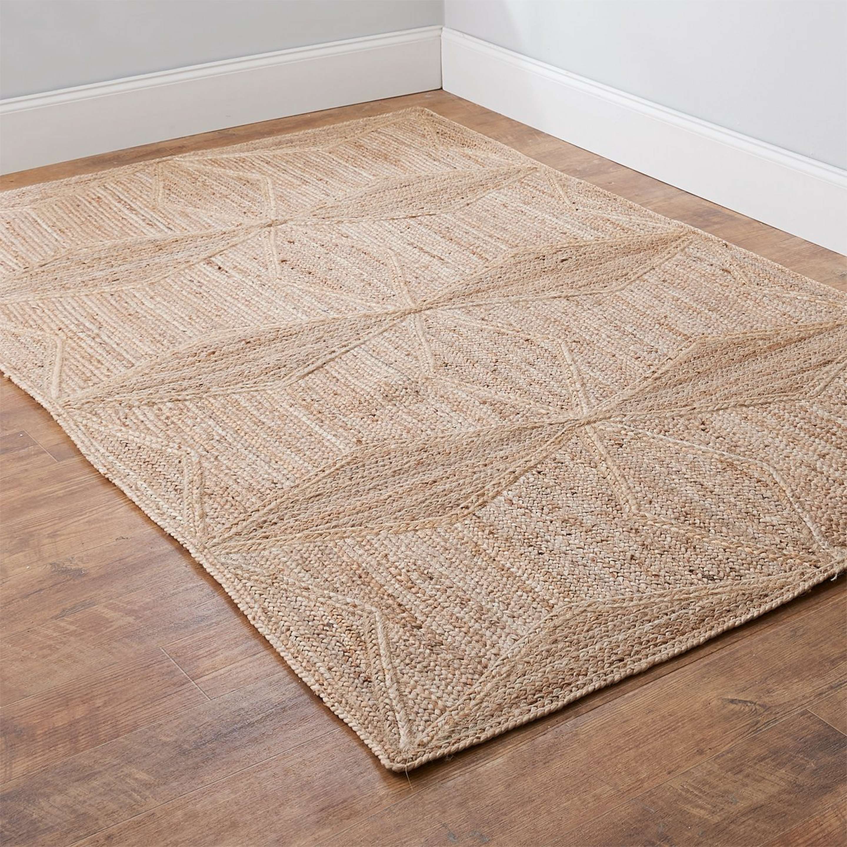 A Havana Braided Jute Rug with Natural color