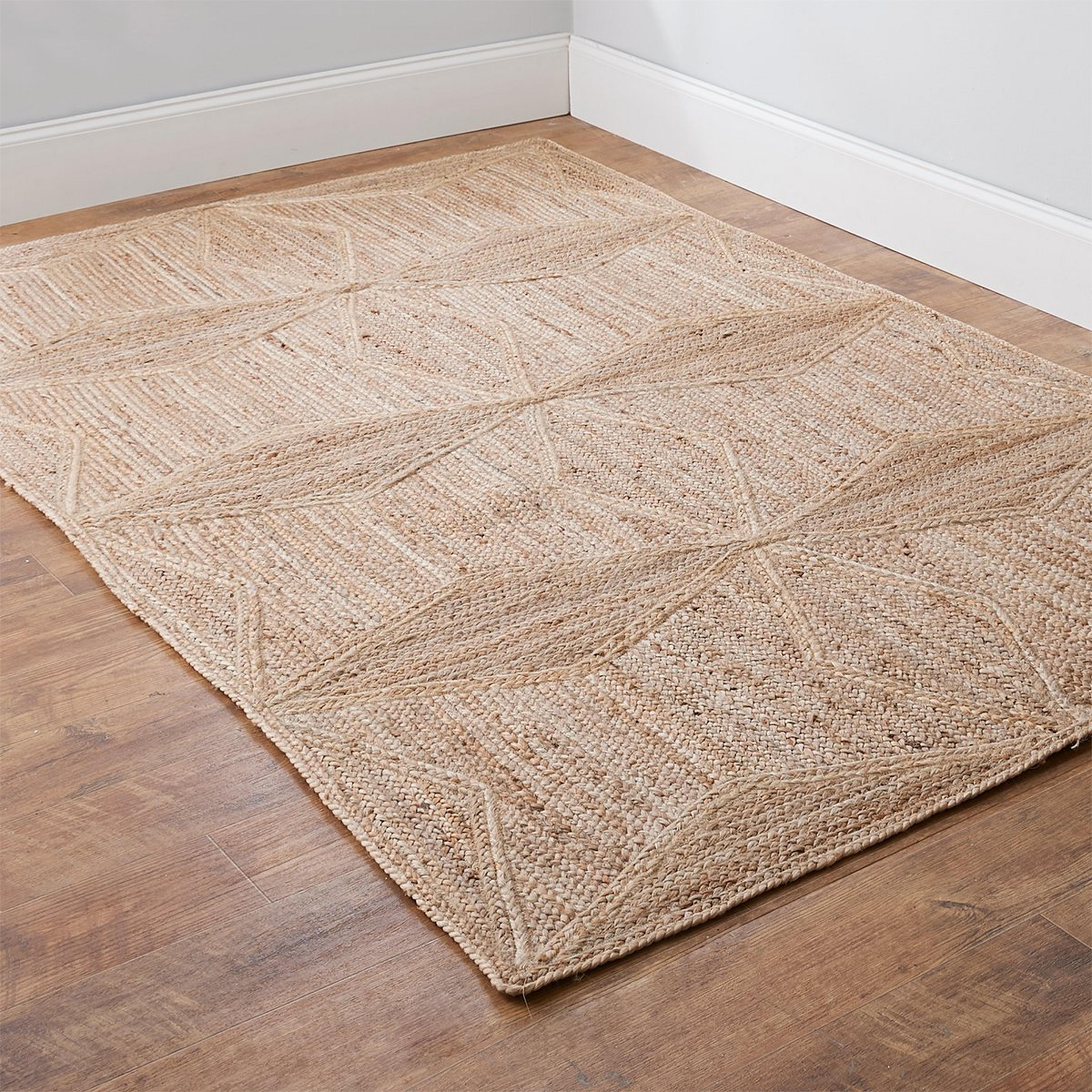 A Havana Braided Jute Rug with Natural color