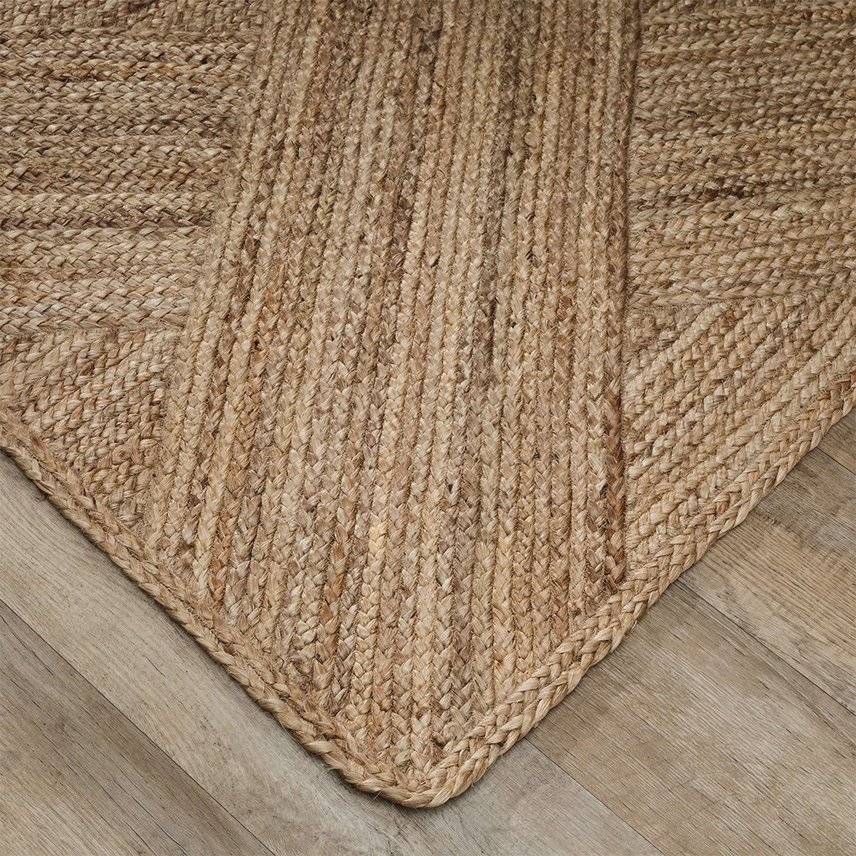 A Crossed Construct Handwoven Rug with Natural Jute color