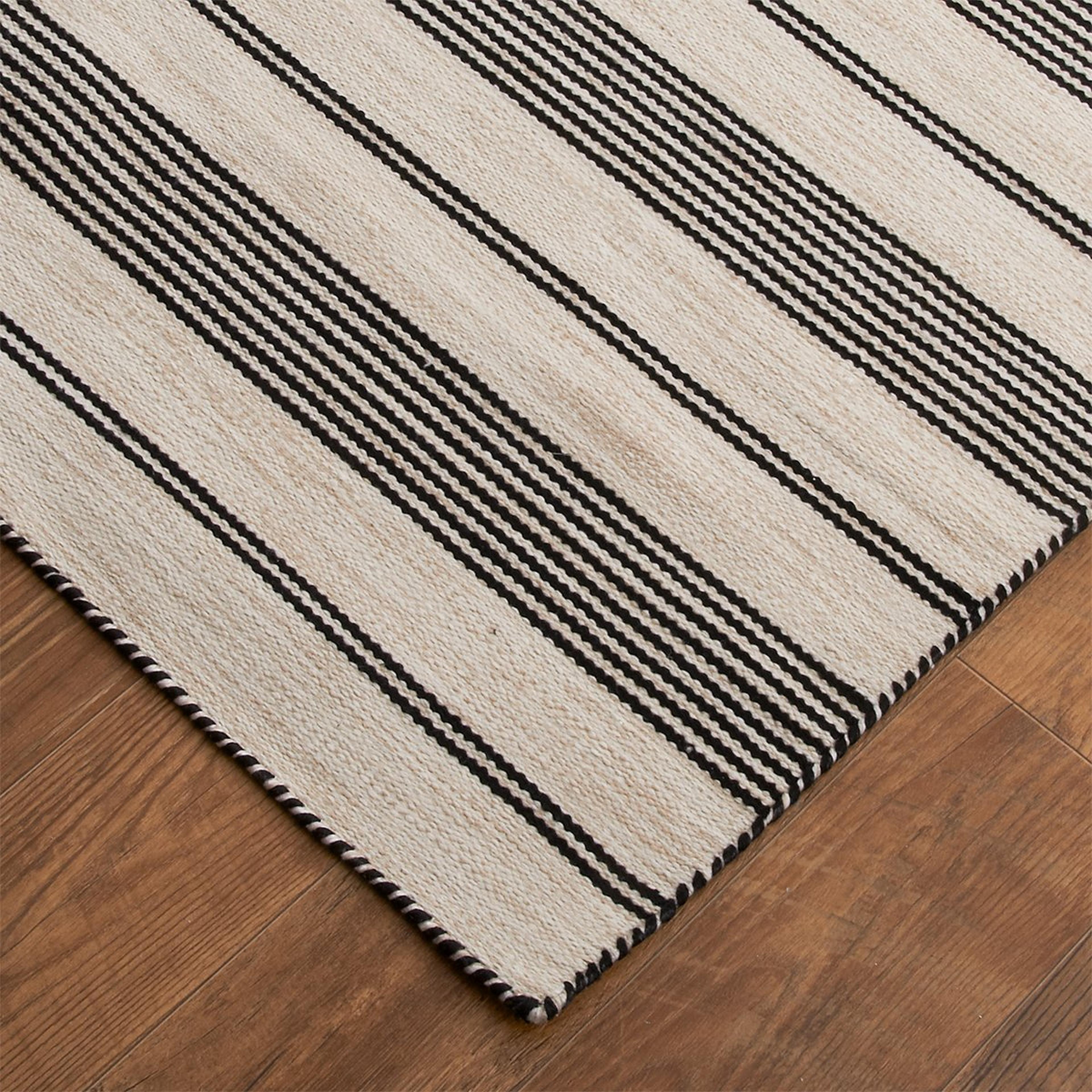 A Ticking Stripe Indoor / Outdoor Rug with Black/Ivory color