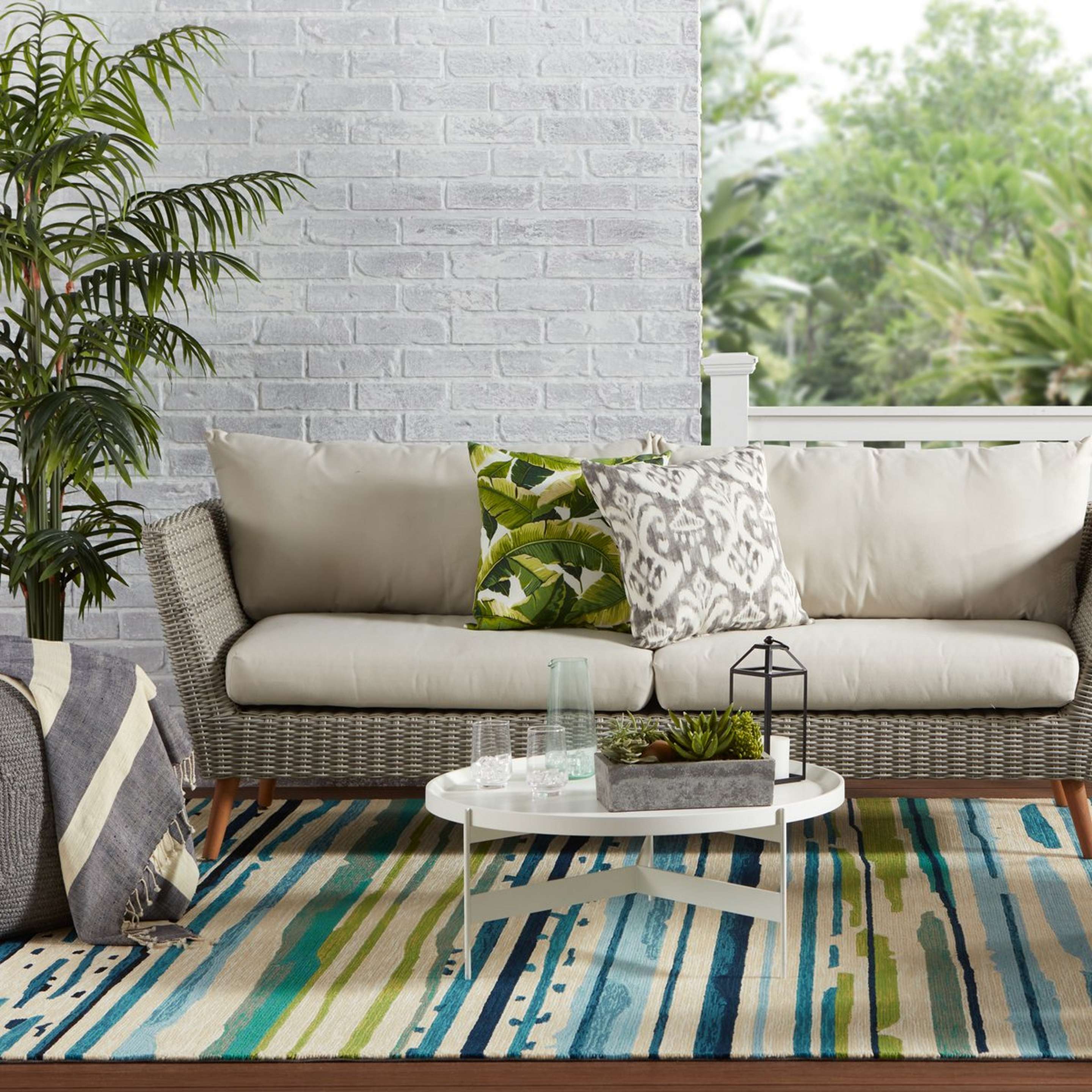 A Ollie Hand-Tufted Indoor / Outdoor Rug with Teal / Lime / Blue / Multi color