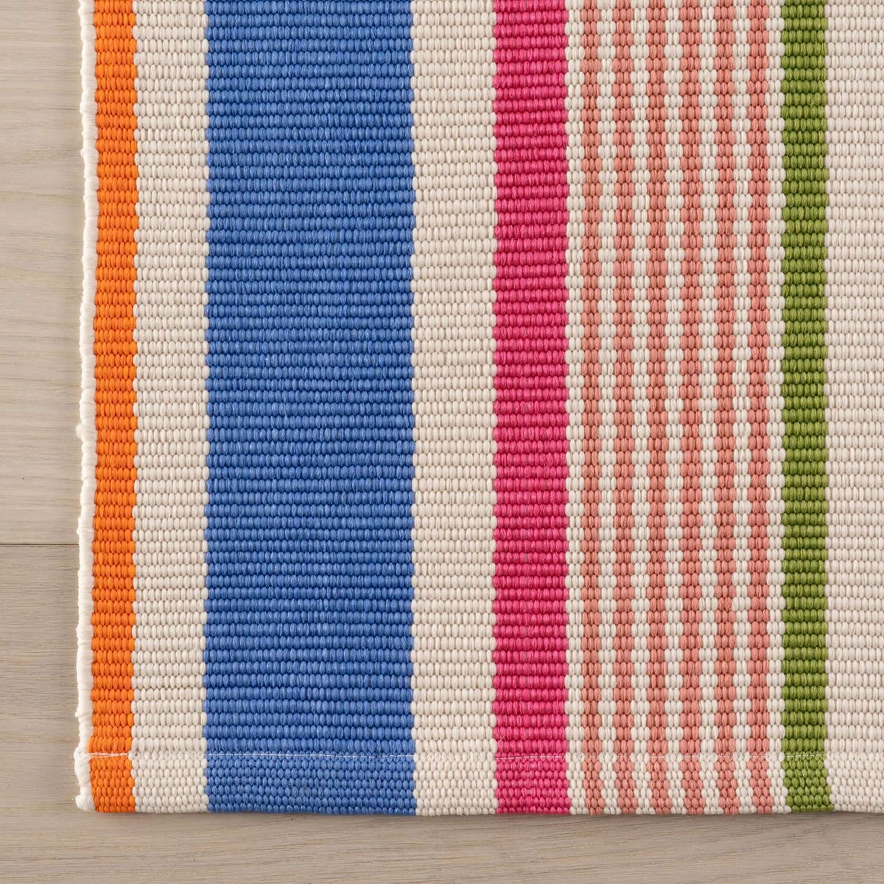 A Trezza Handwoven Indoor / Outdoor Rug with Blue / Pink / Coral / Green / Orange color