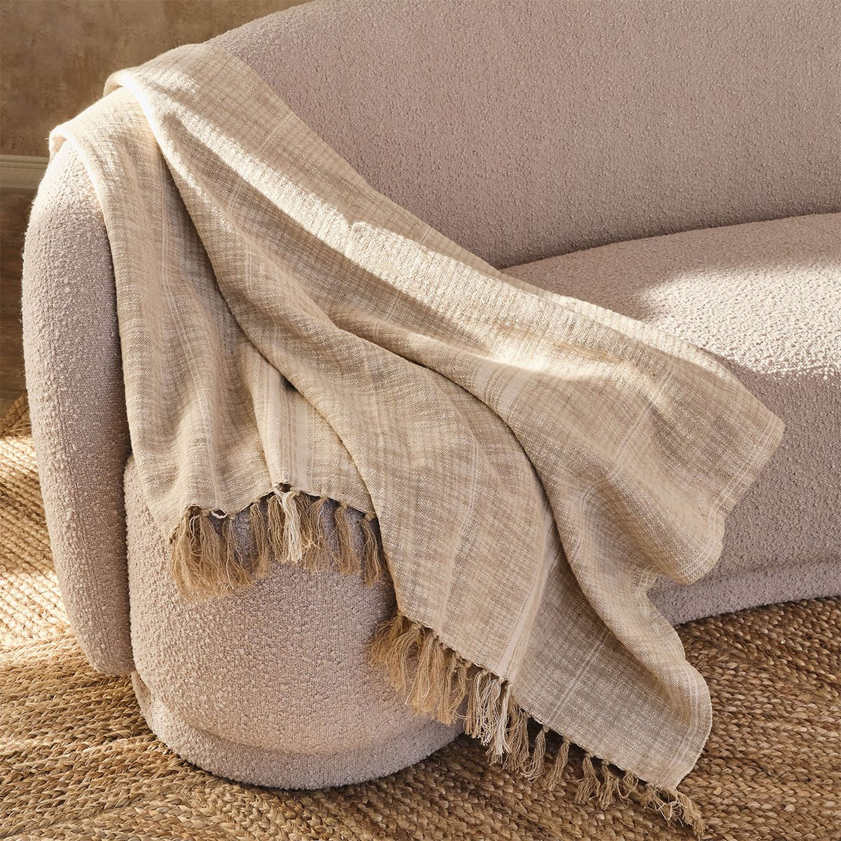 A Bianci Throw with Natural / Ivory color