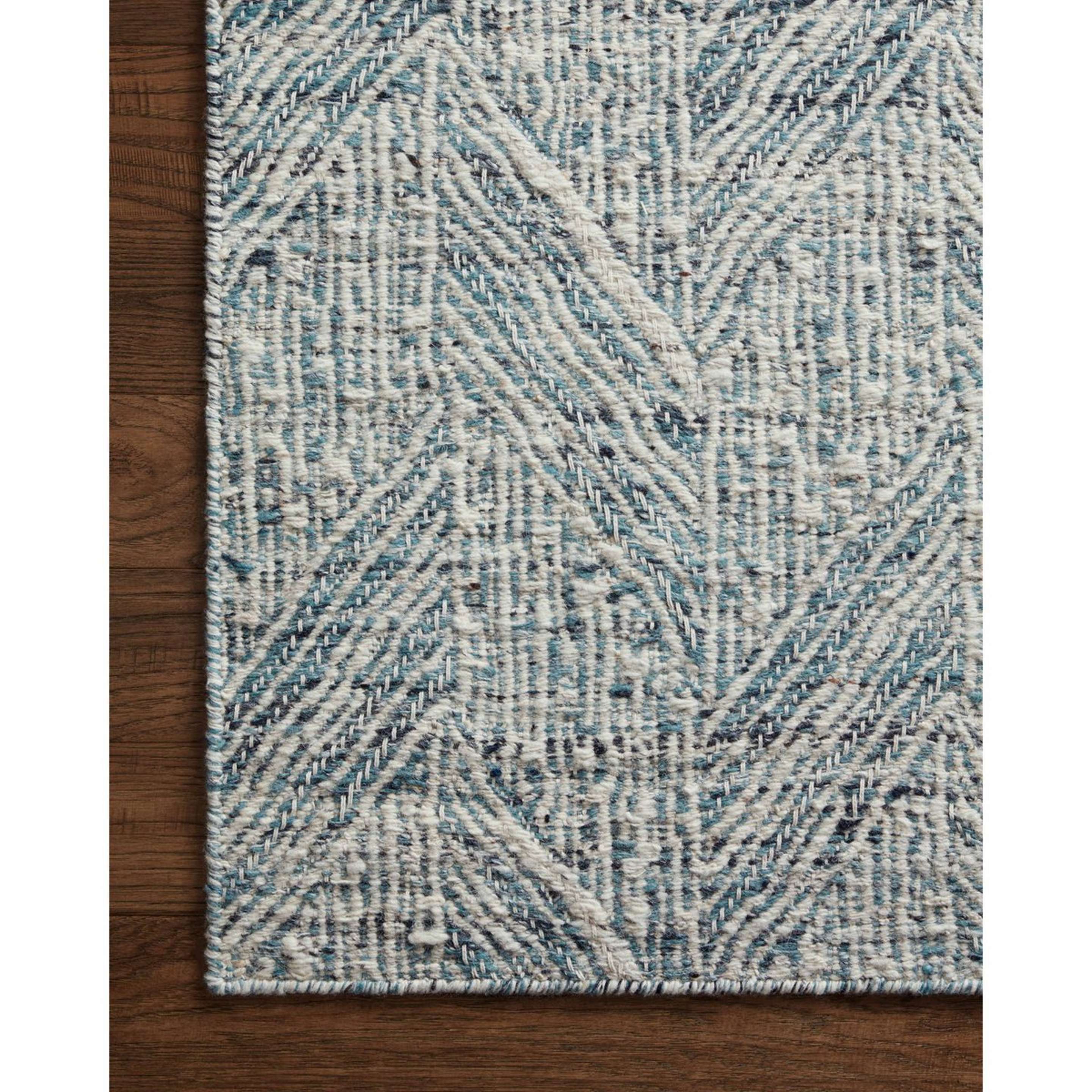 A Kietz Handwoven Rug with Blue / Ivory color