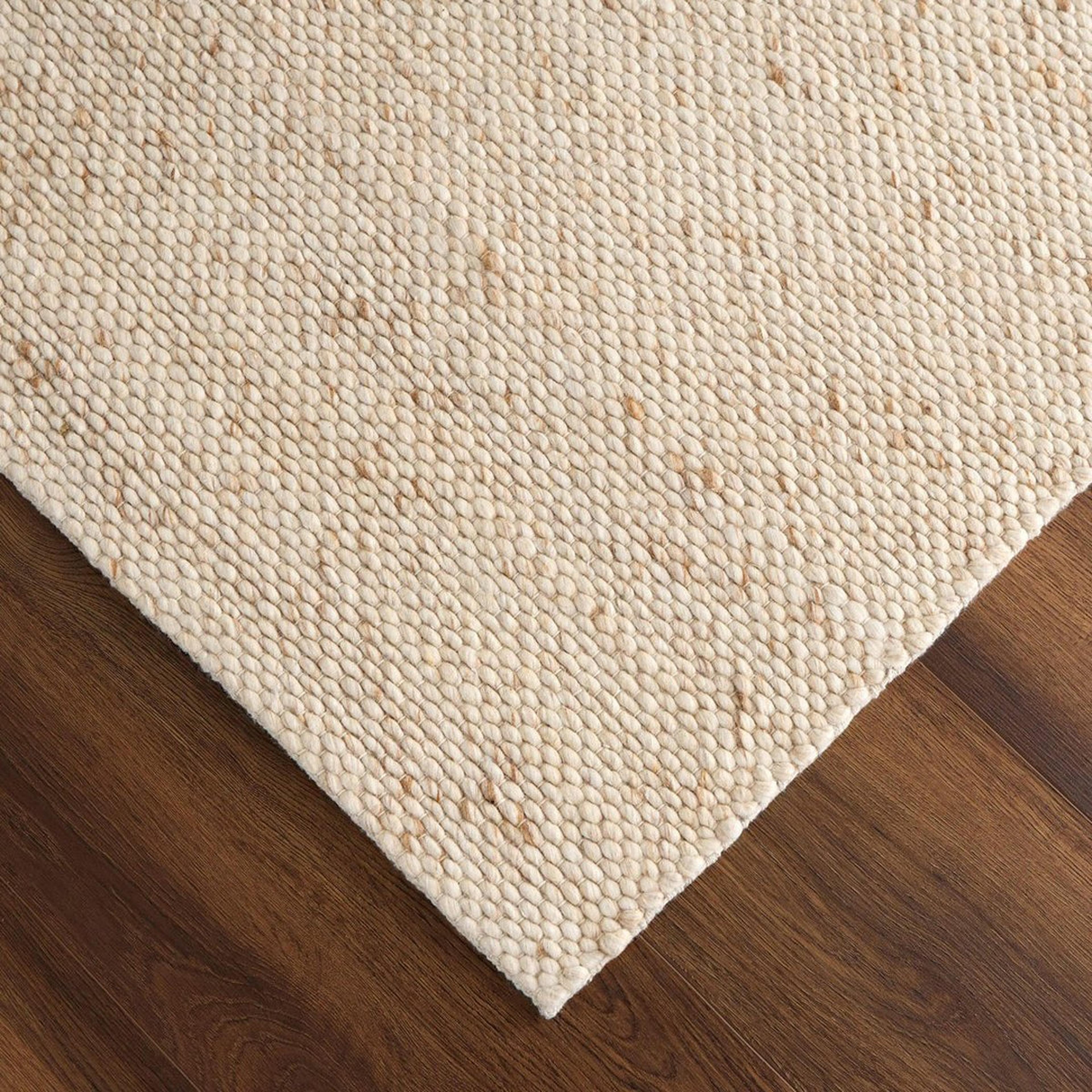 A Taghrid Handwoven Rug with Speckled Cream color