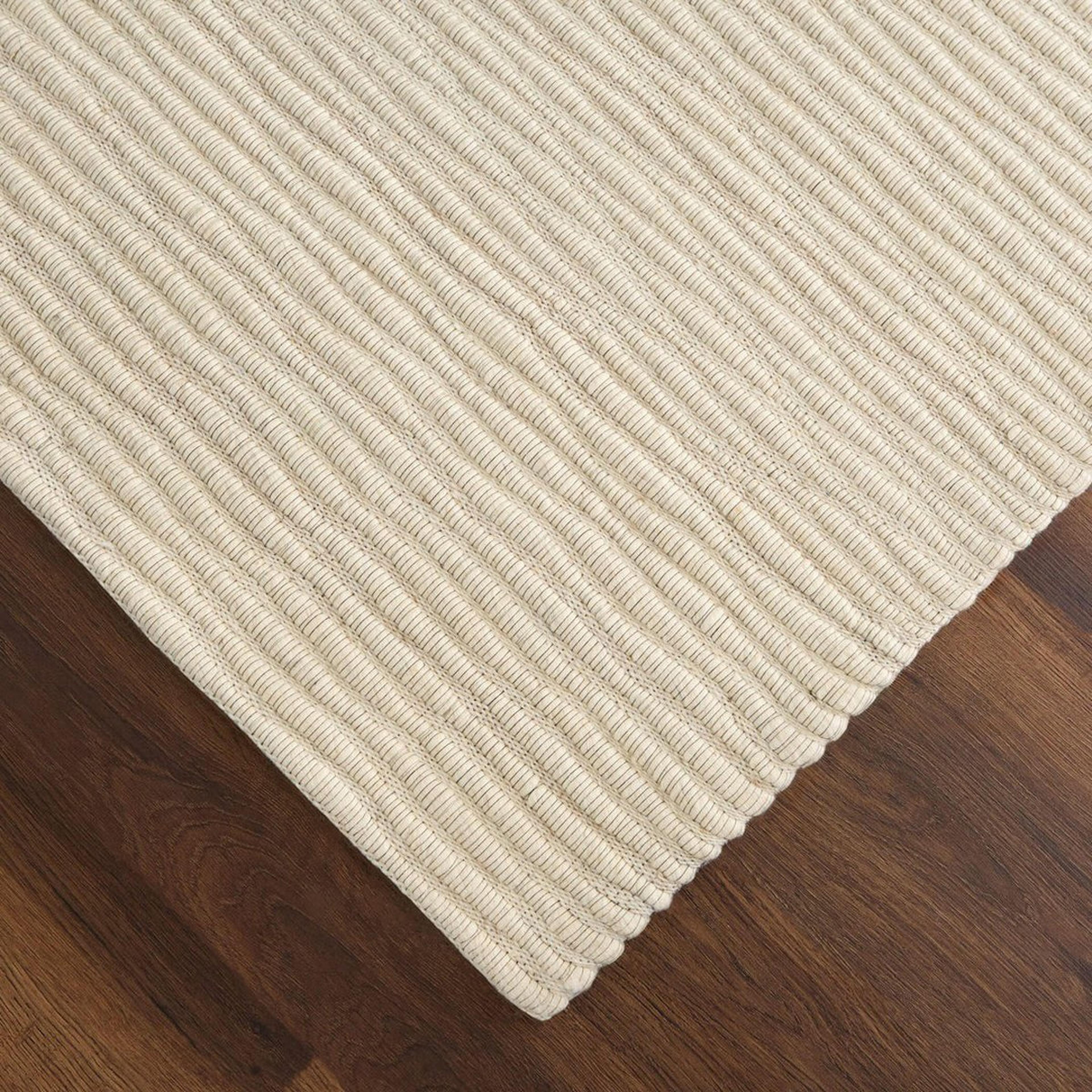 A Sybil Handwoven Rug with Beige color