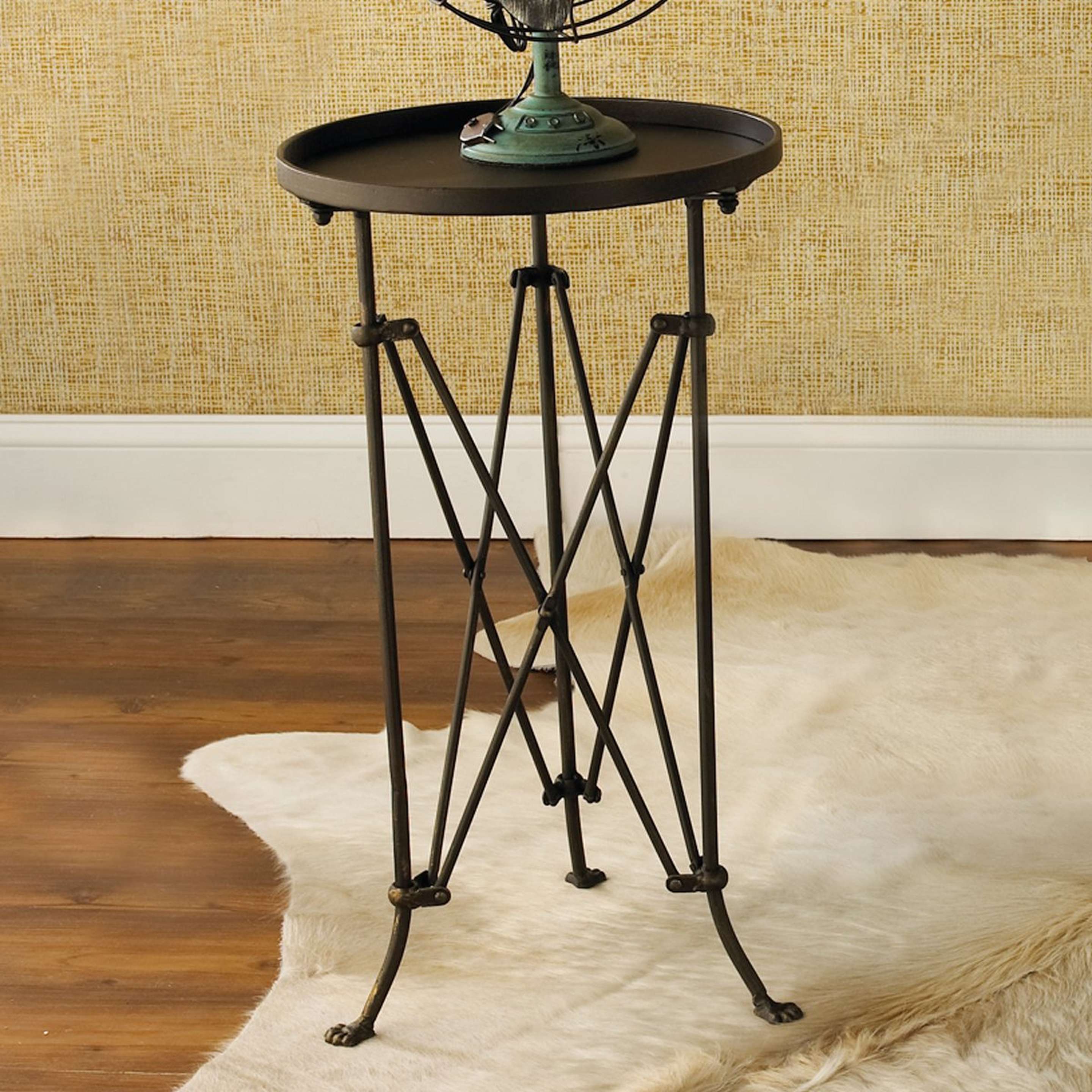 A Metal Trestle Side Table with Blackened Bronze color