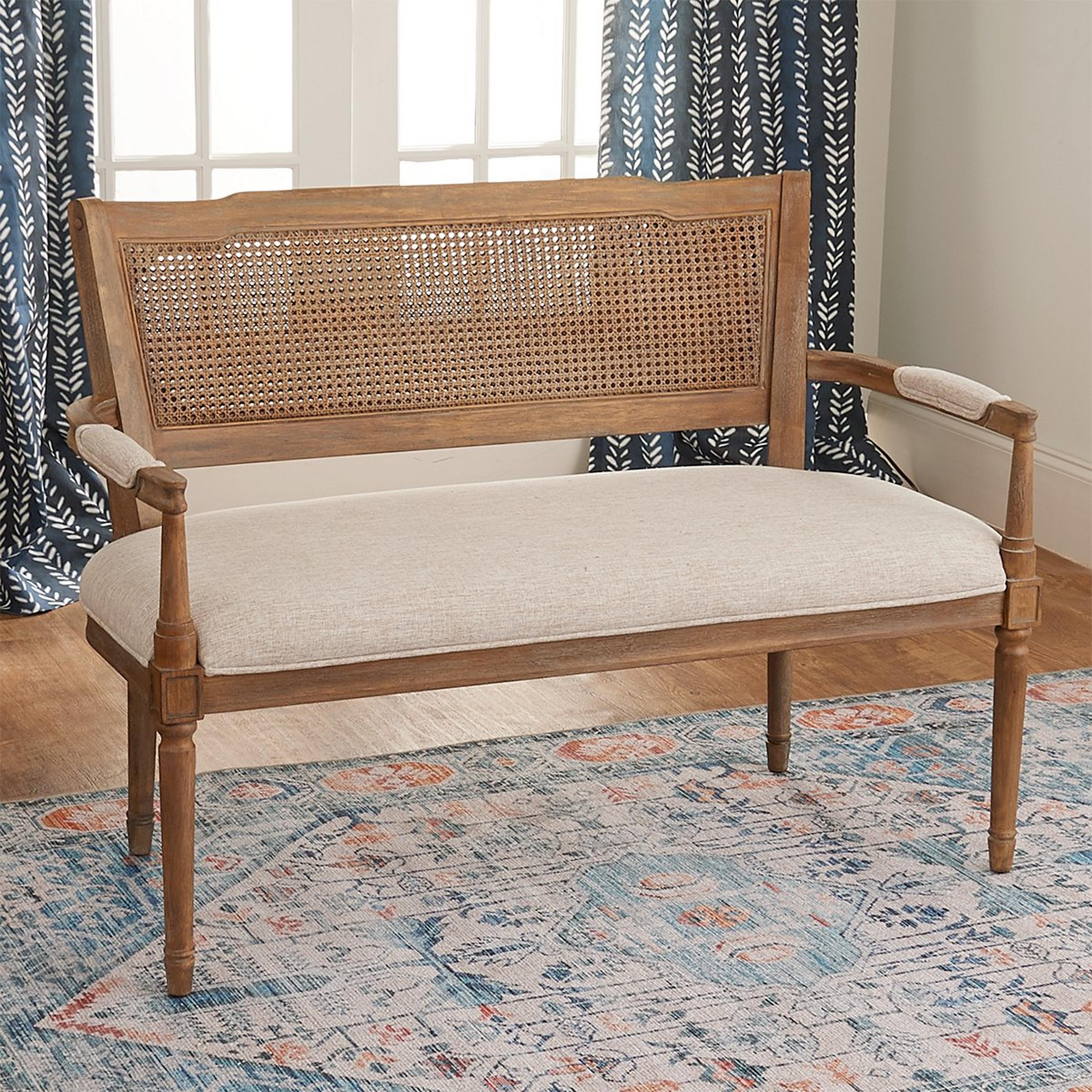 A Netherfield Settee with Light Wood / Beige color