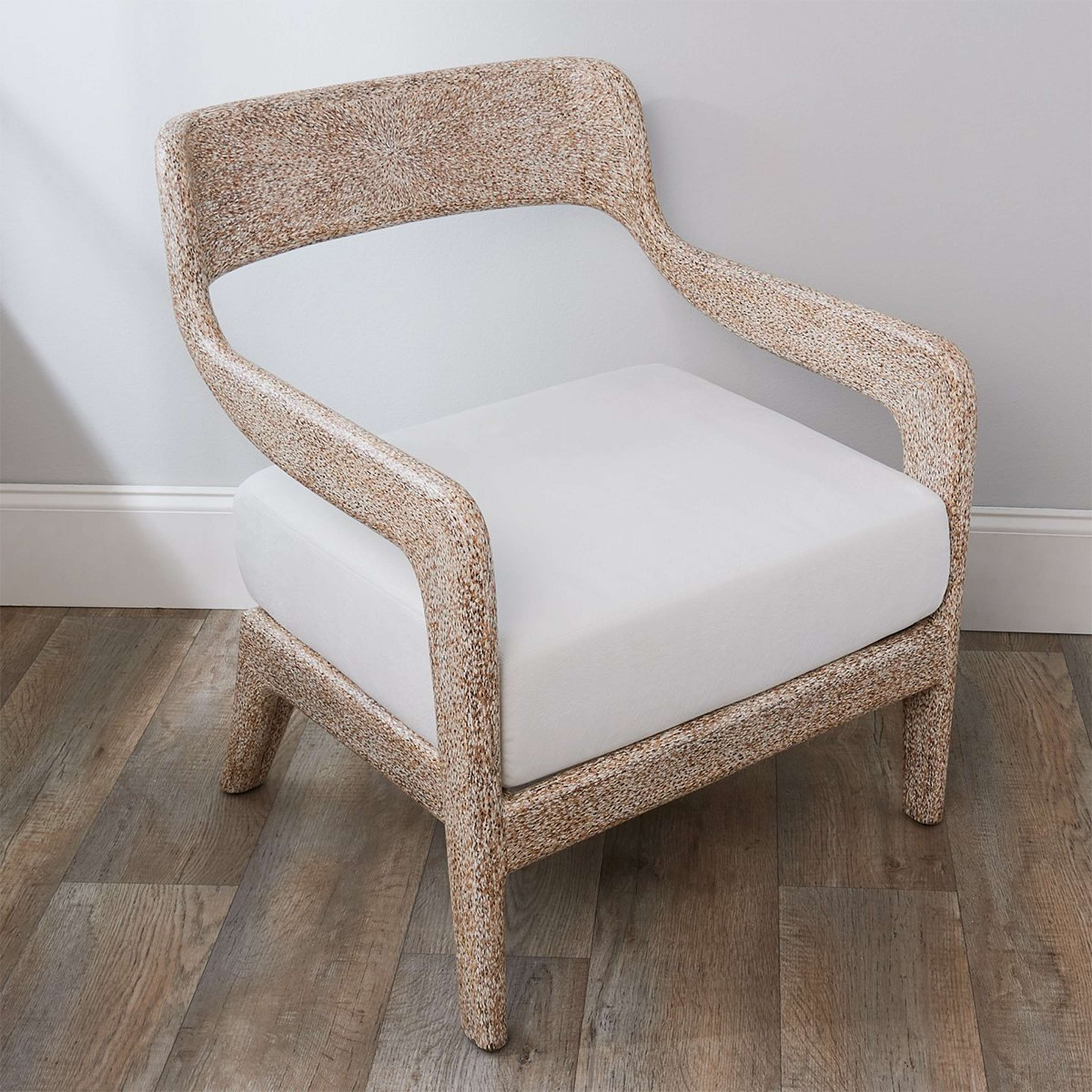 A Henna Resin Lounge Chair with Whitewash Resin color