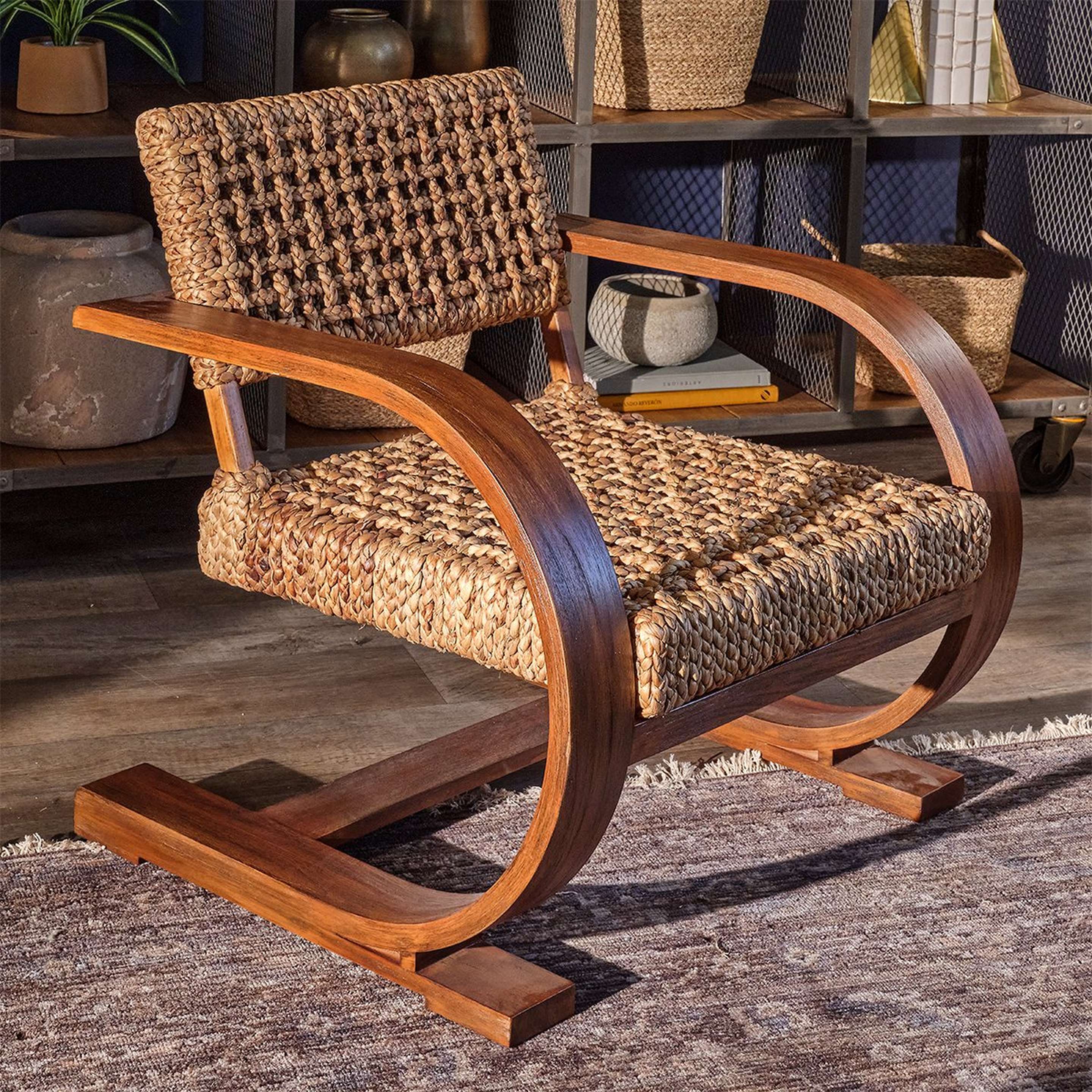 A Ida Arm Chair with Natural / Dark Stained Wood color