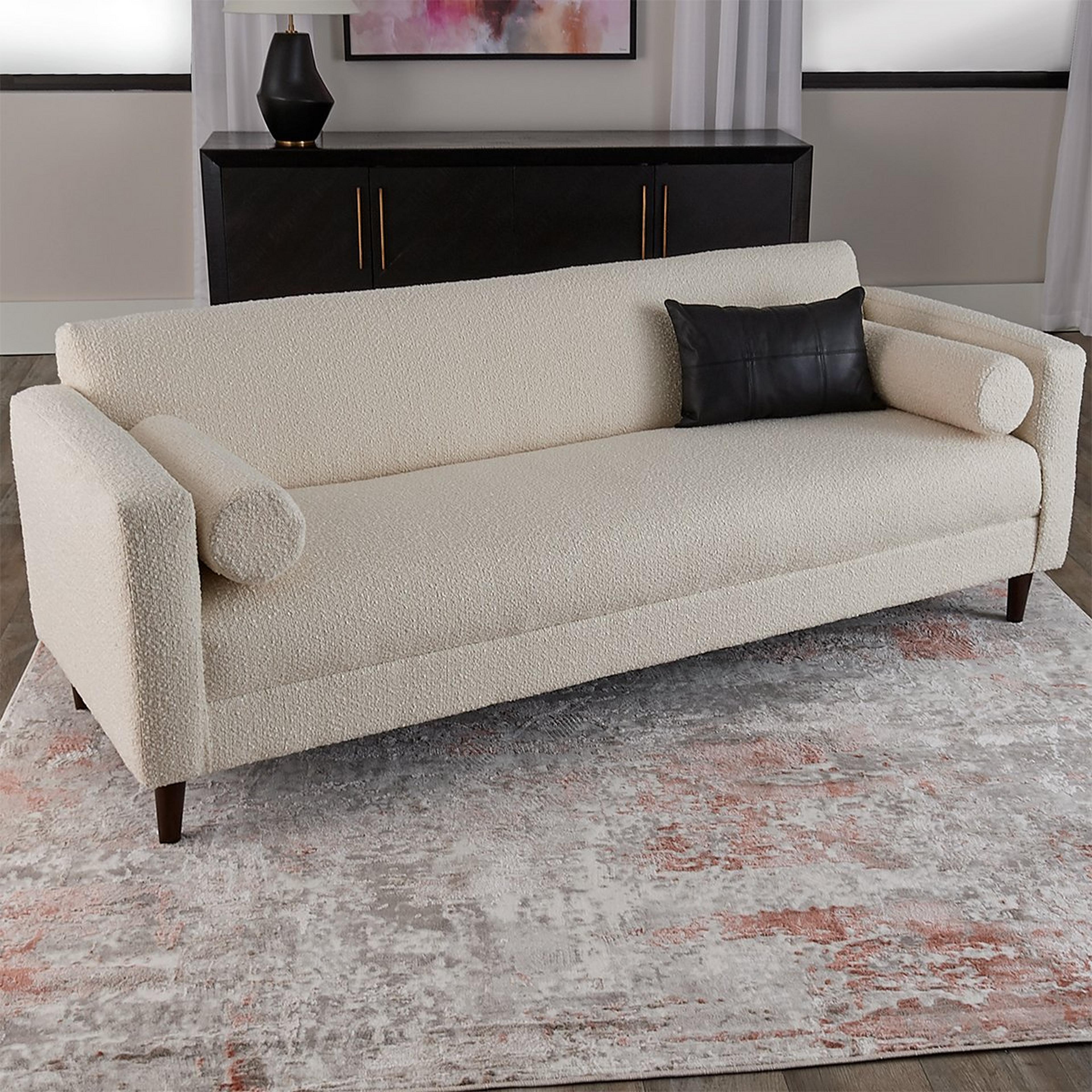A Cyril Sofa with White Upholstered Boucle color