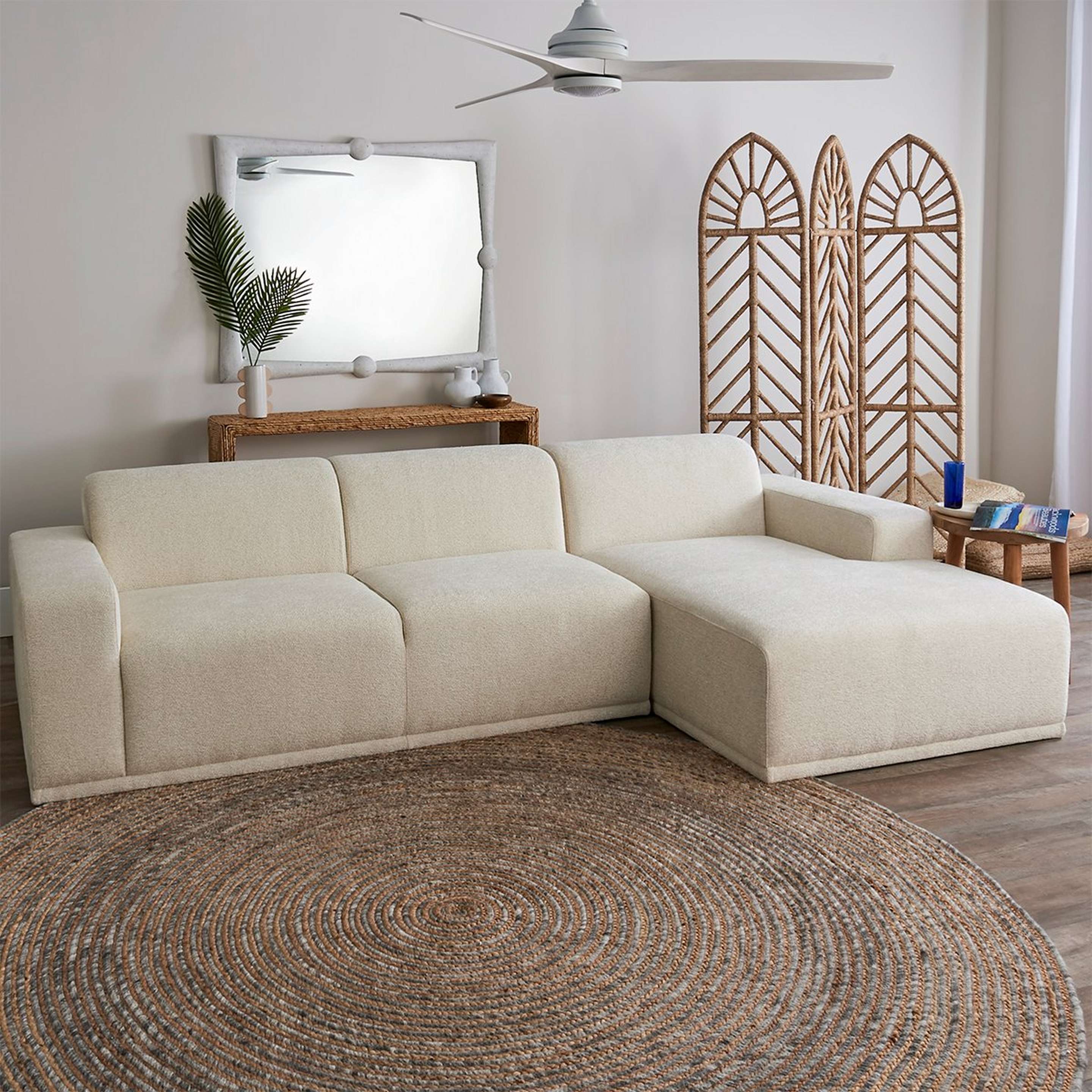 A Adriano Right Sectional Sofa - Boucle with White Boucle Upholstery color
