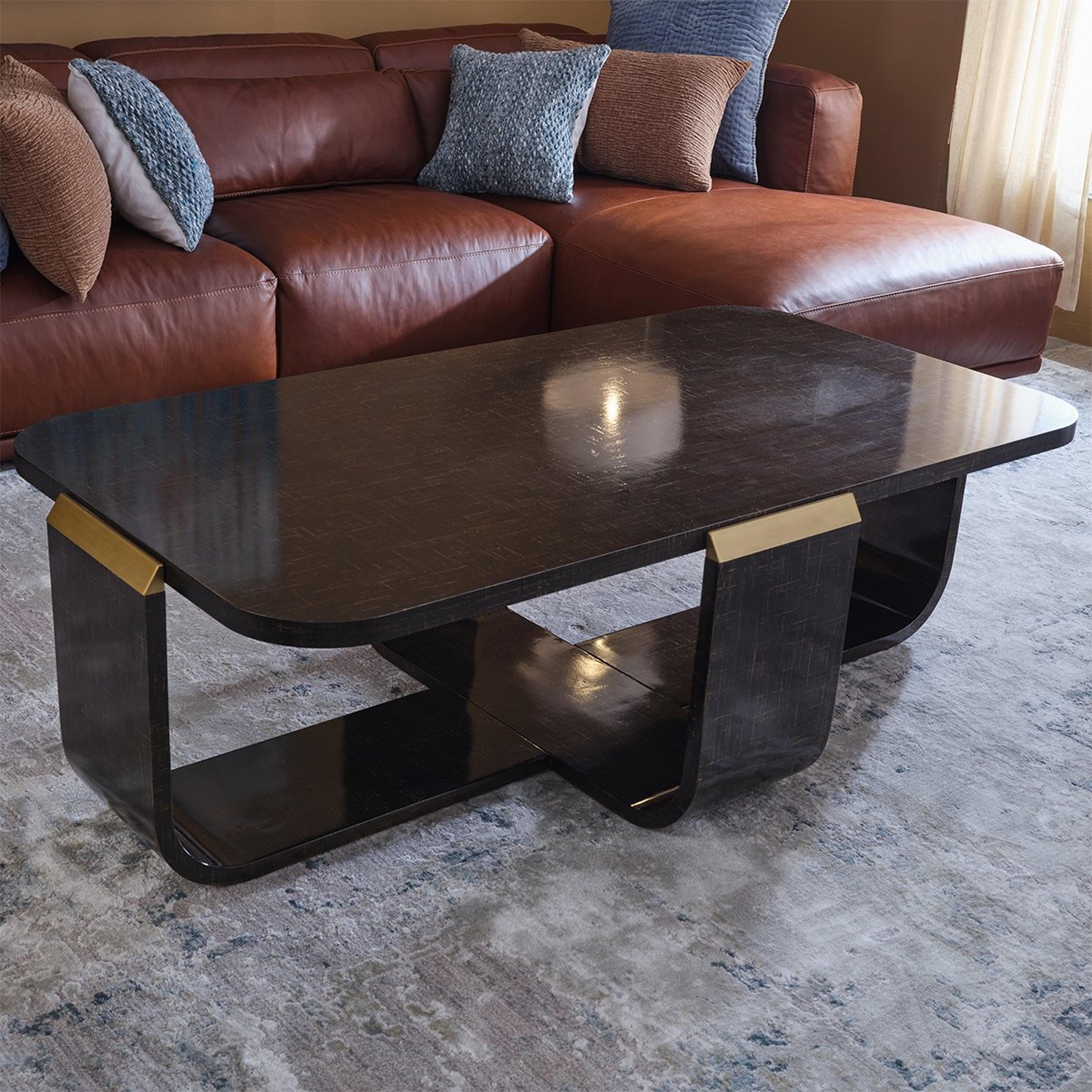 A Fritz Coffee Table with Dark Wood / Gold Accents color