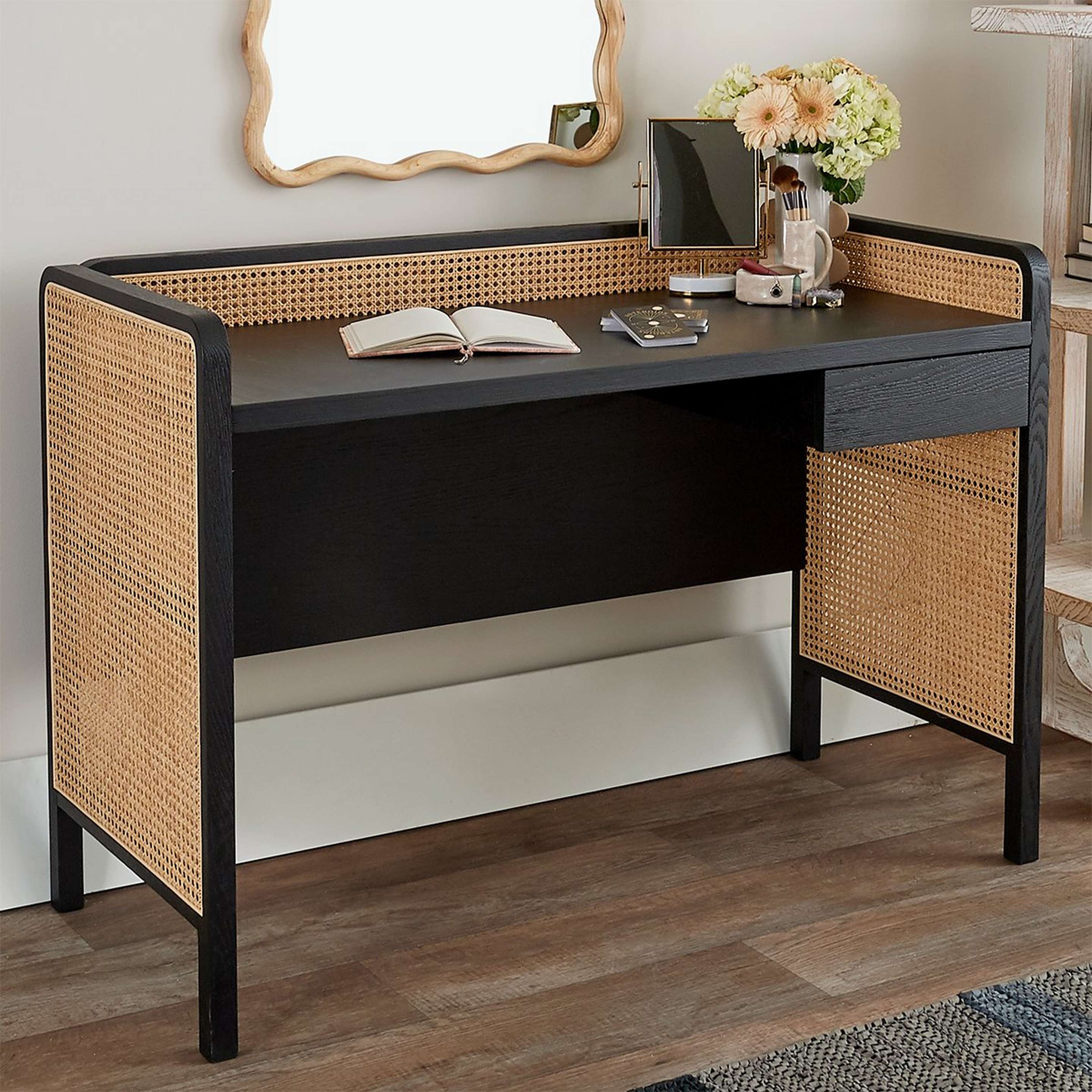 A Tabitha Desk with Black Wood / Natural Rattan color