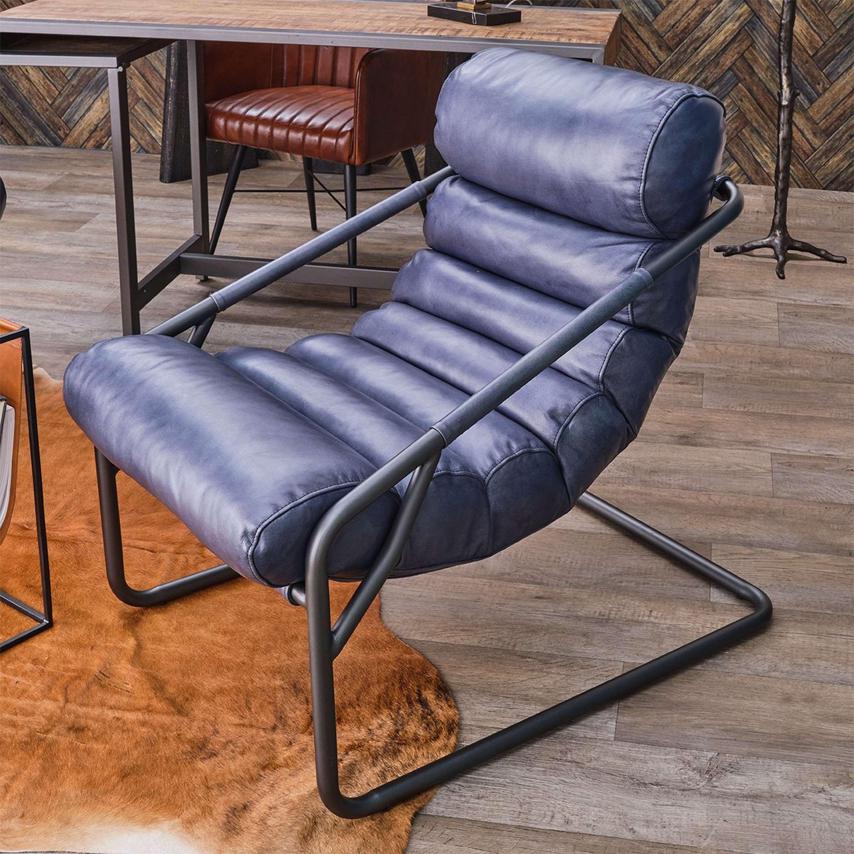 A Buffalo Lounge Chair with Blue Leather color
