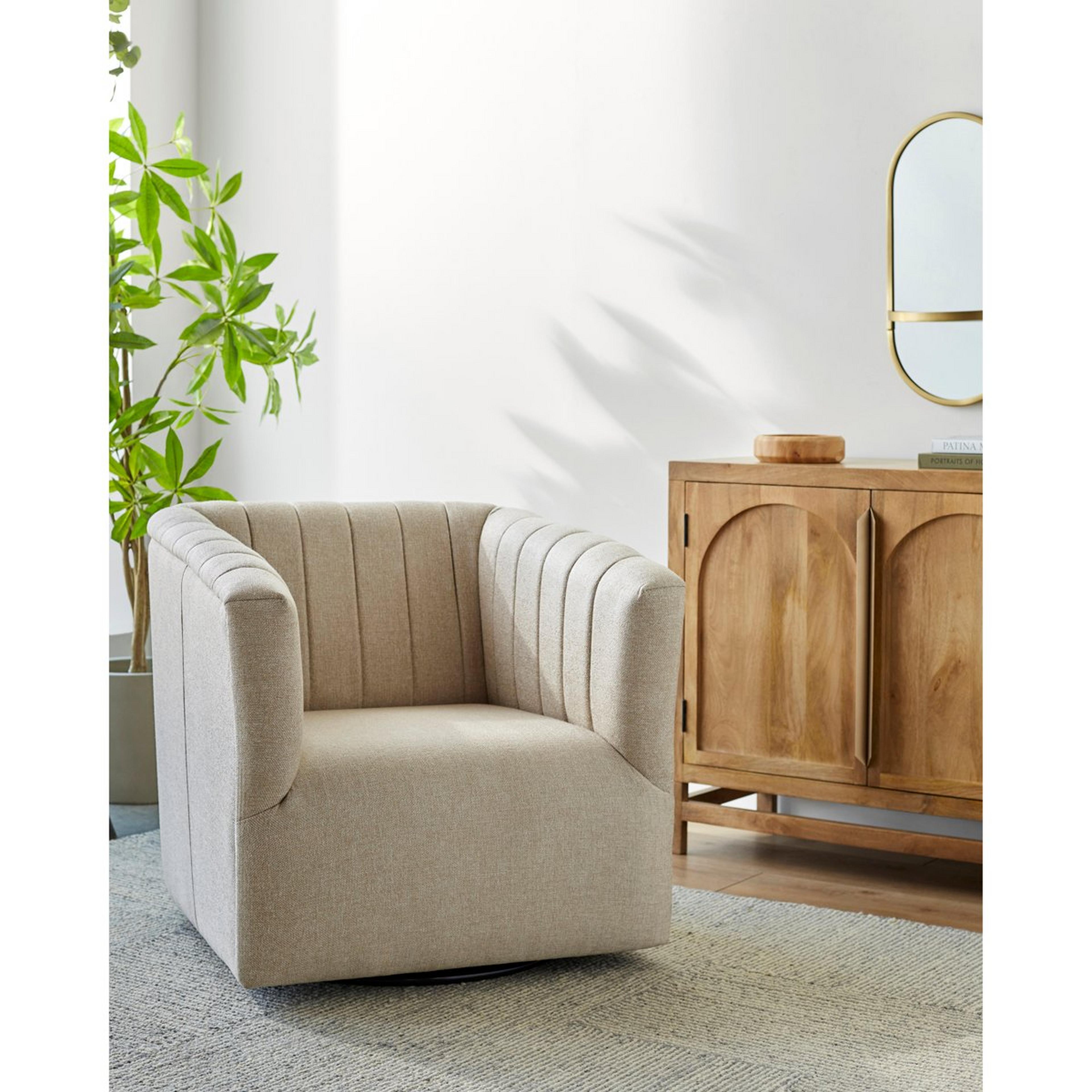 A Nadine Swivel Chair with Cream color