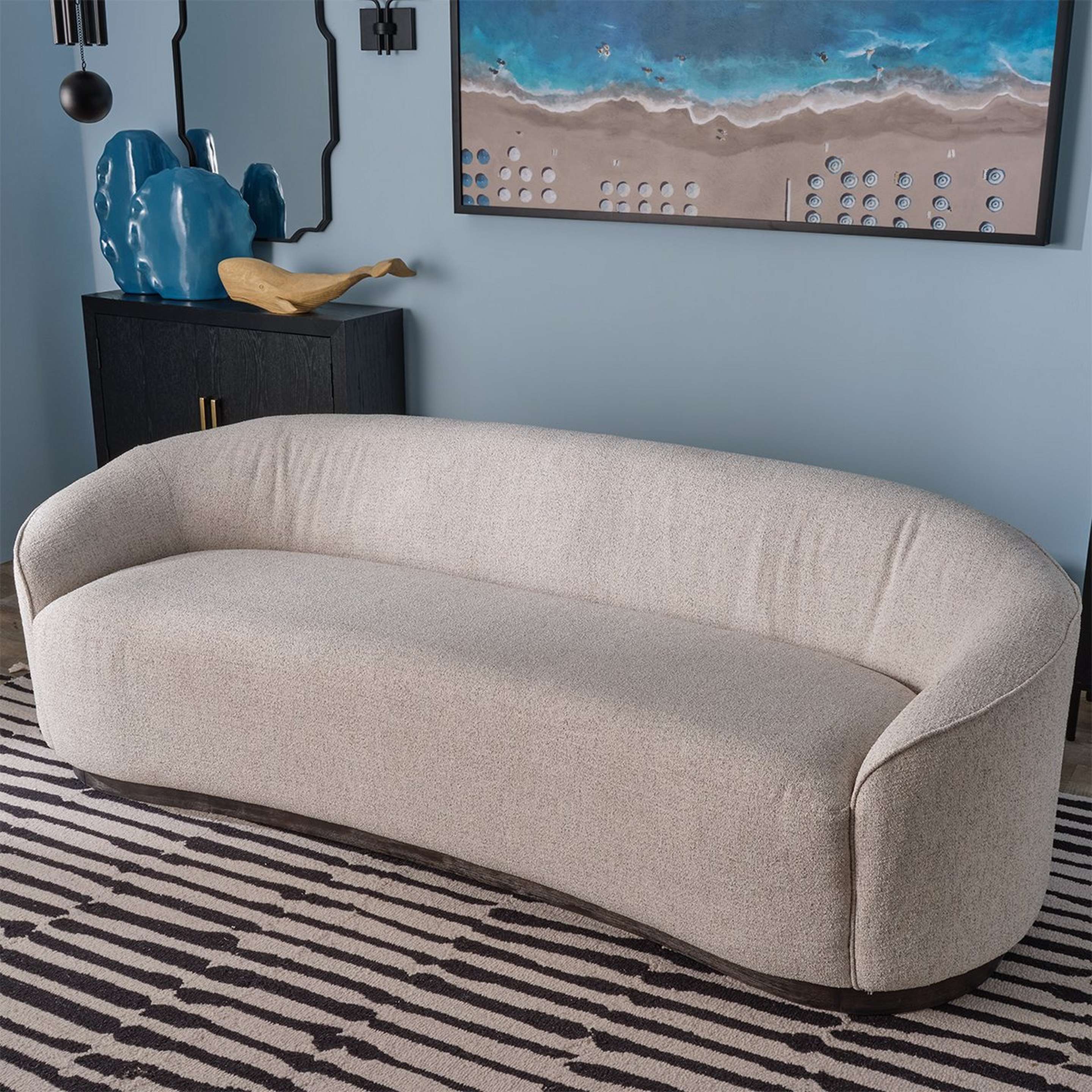 A Newton Sofa with Oatmeal Upholstery color