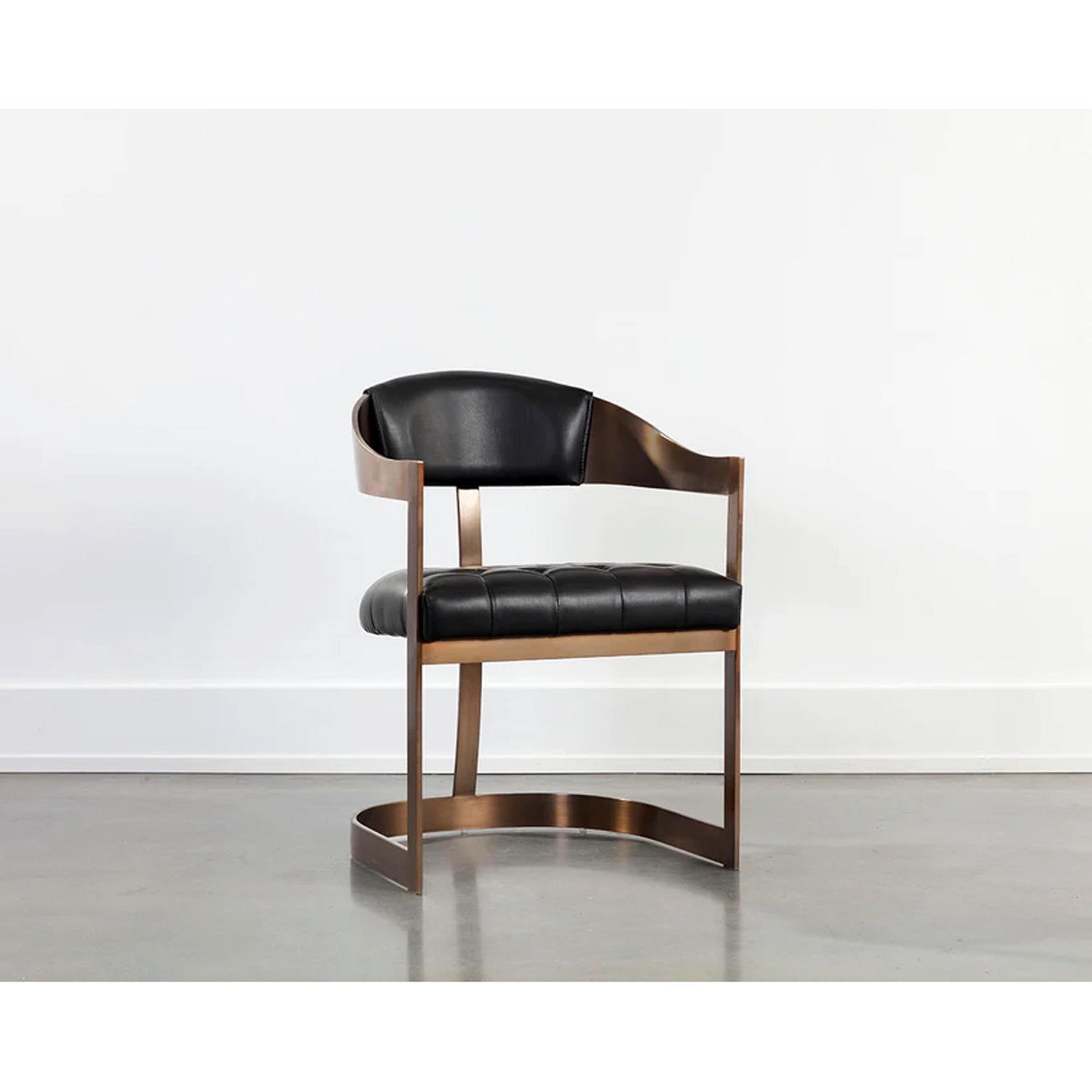 A Brody Dining Chair with Black Leather Upholstery / Antique Brass color