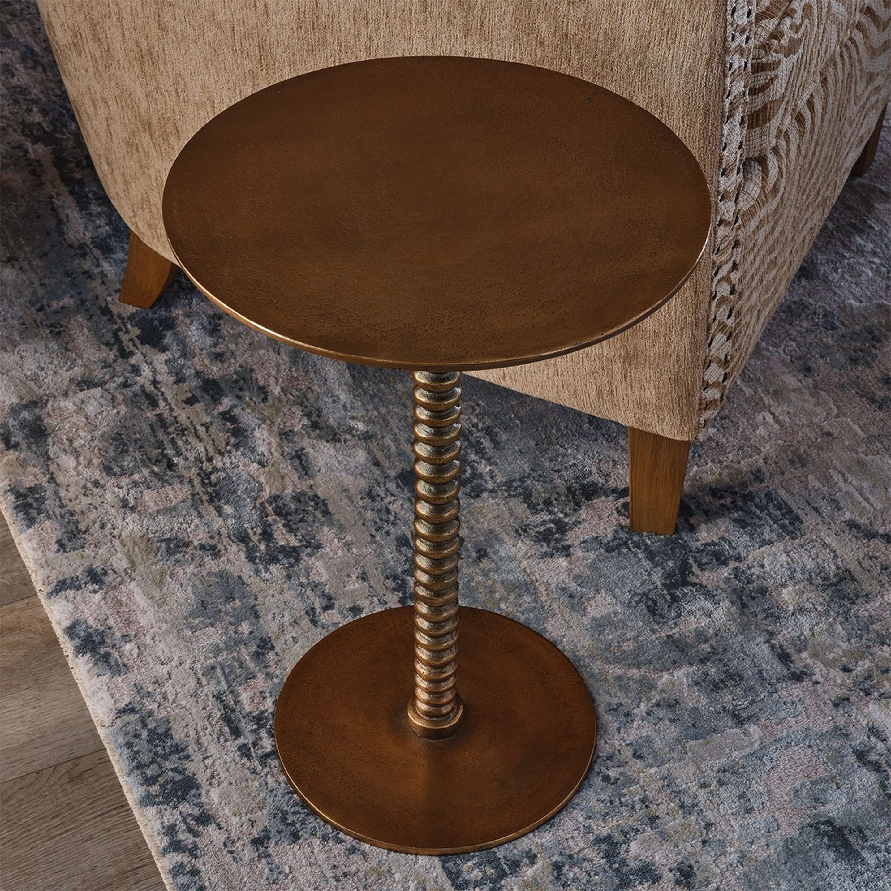 A Rao End Table with Brass Finish color