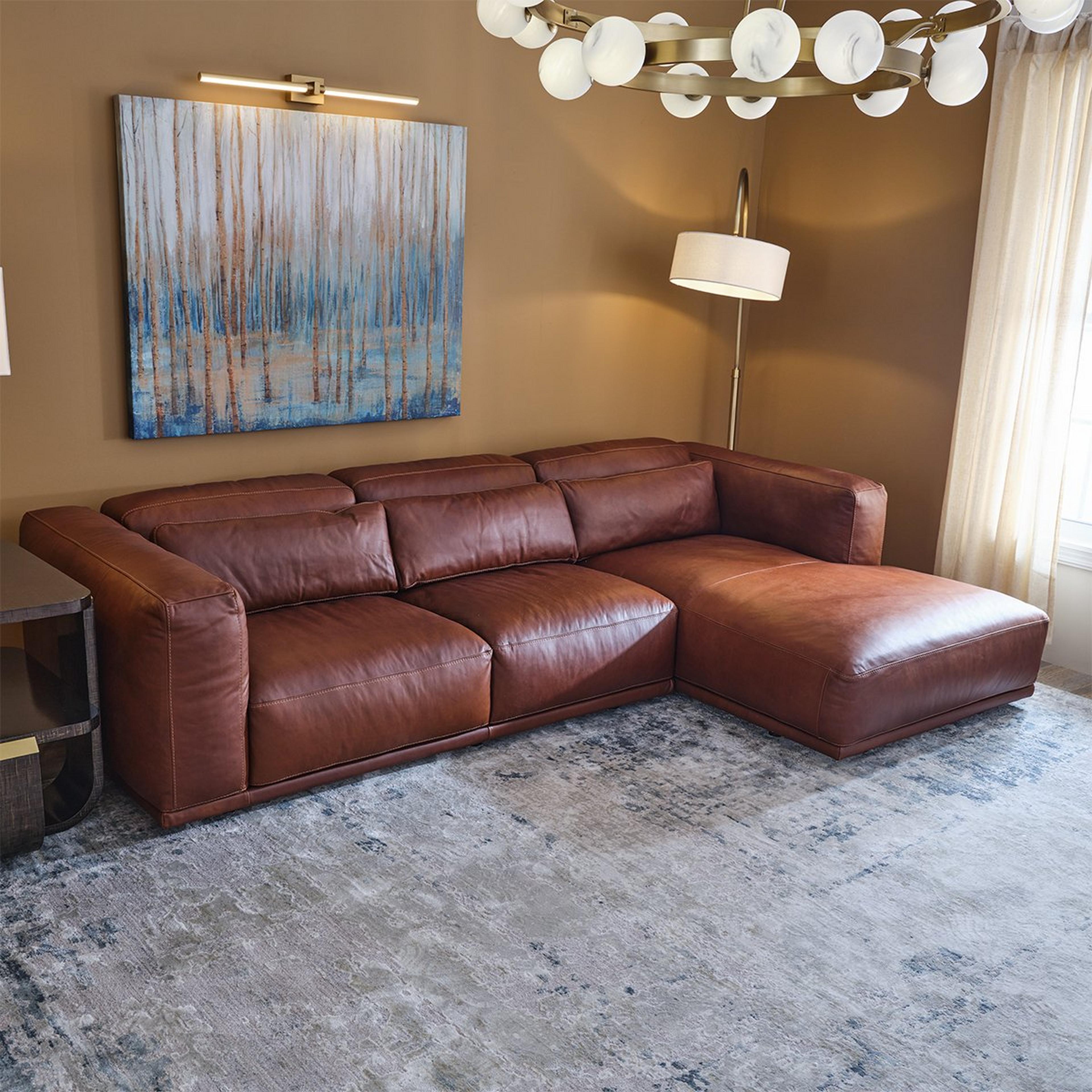 A Cavalier Sectional with Aged Cognac Leather color