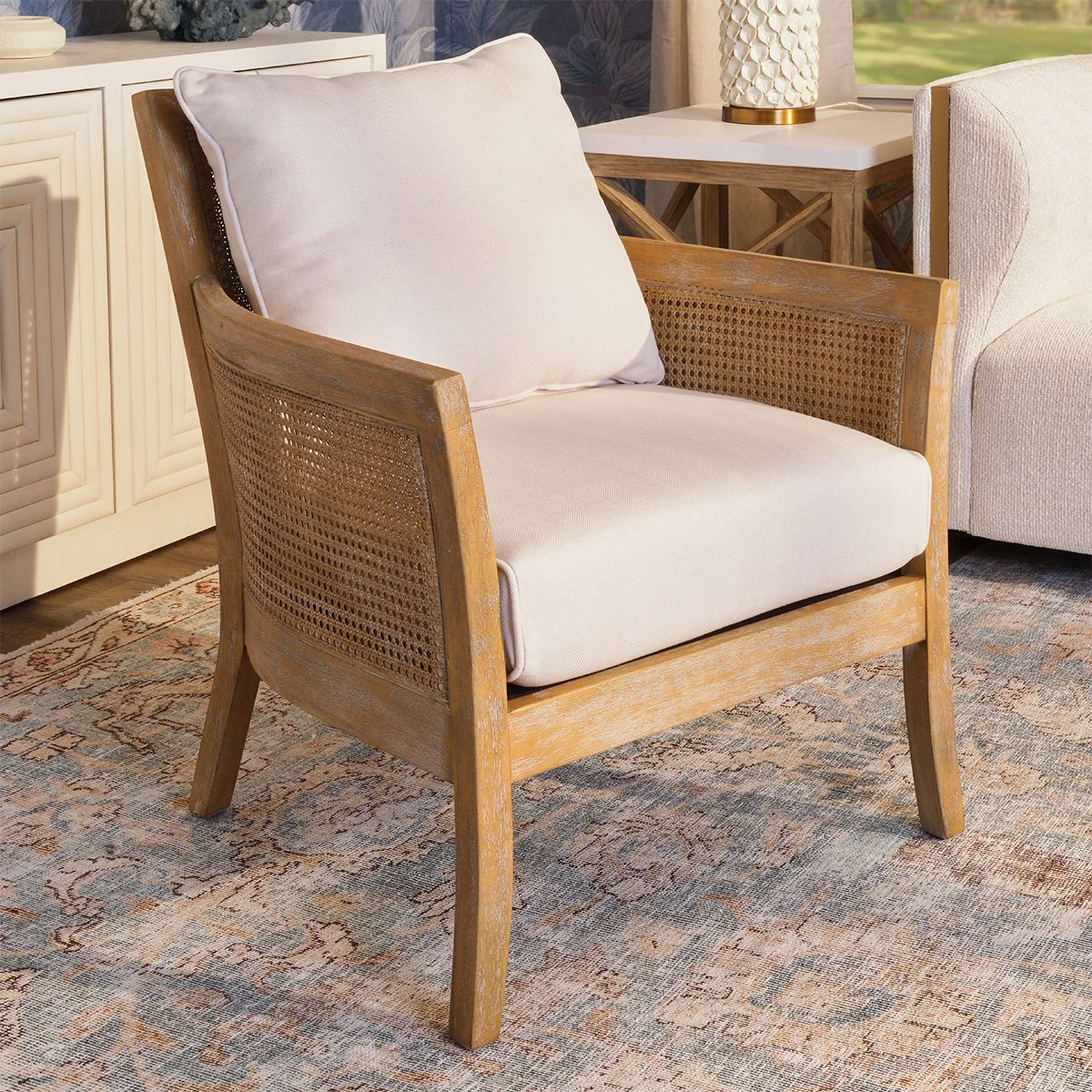 A Schiller Accent Chair with Gray Wash Wood / Caning / Off White Upholstery color
