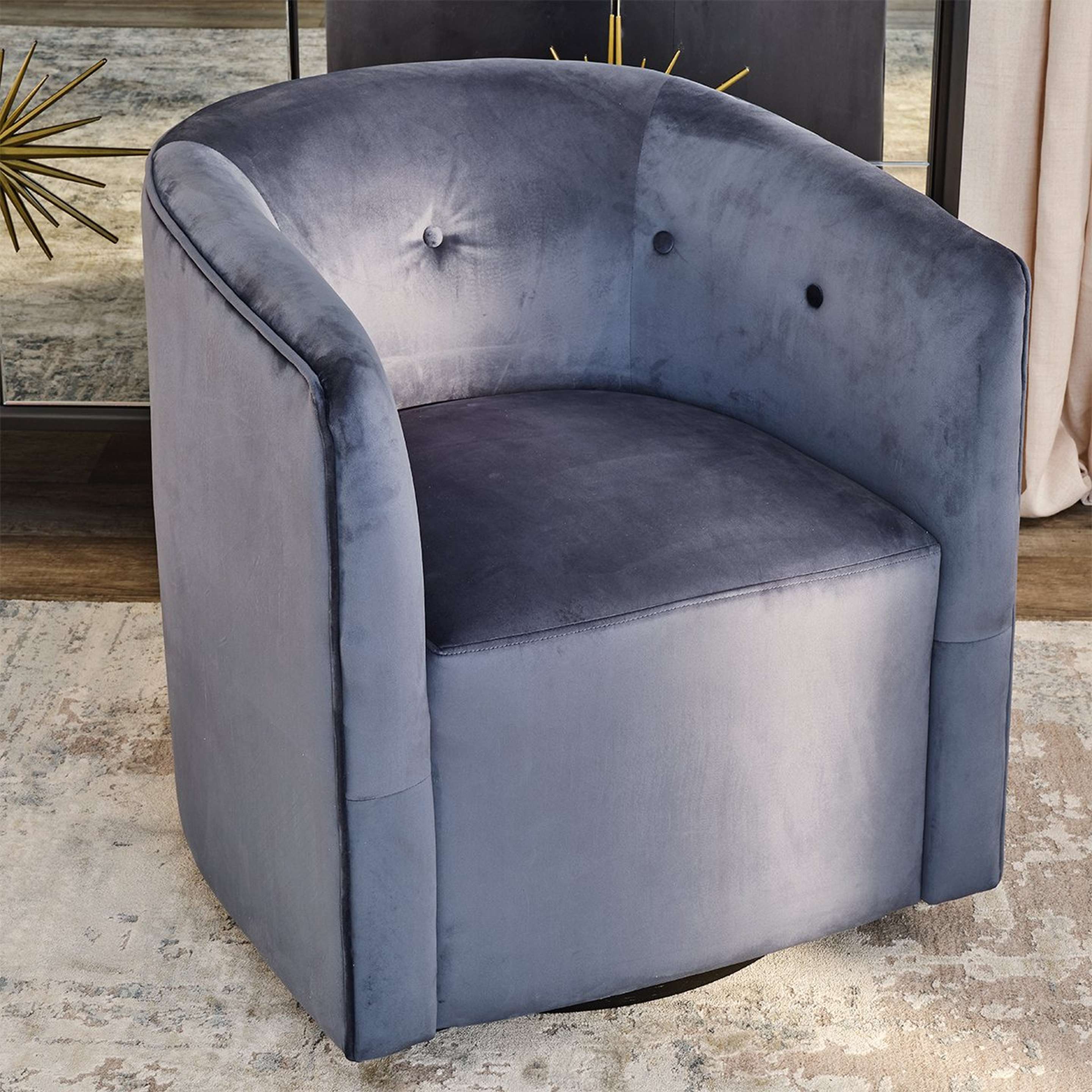 A Yukino Swivel Chair with Blue Velvet color