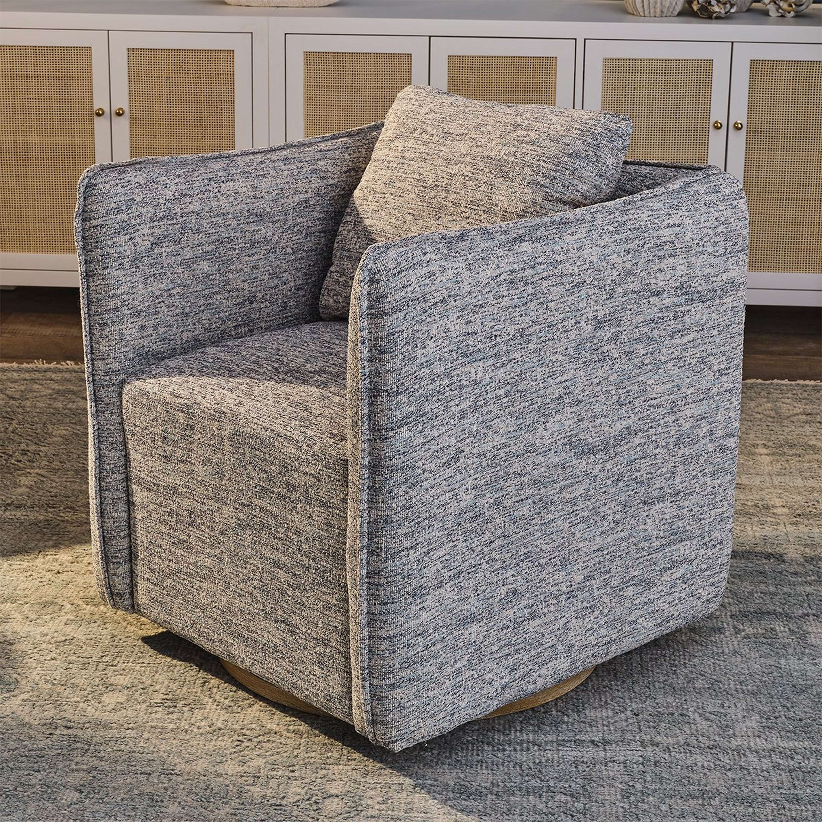 A Eisner Swivel Chair with Faded Denim Blue color