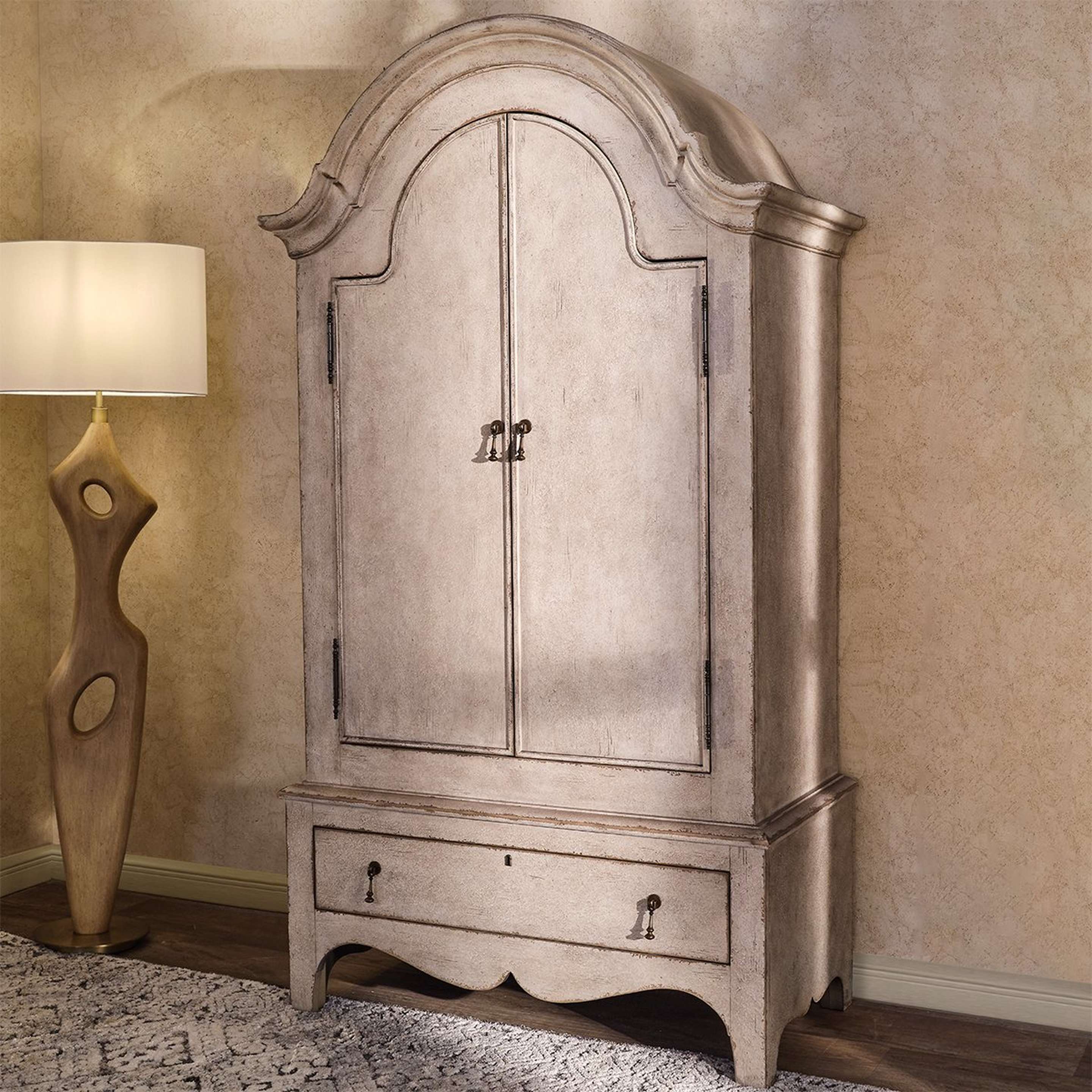 A Swanly Armoire with Antique White color