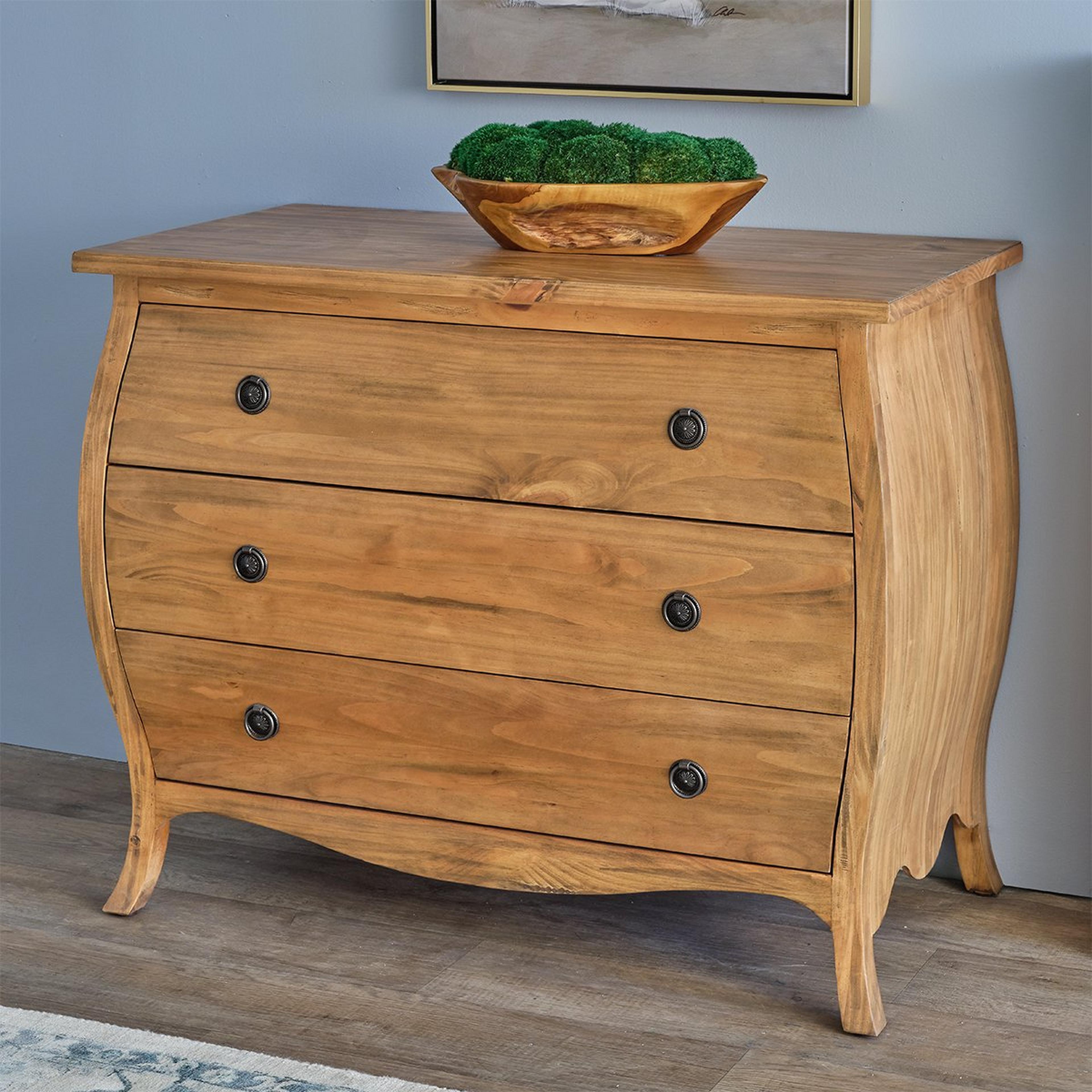A Caldana Cabinet with Natural Wood color