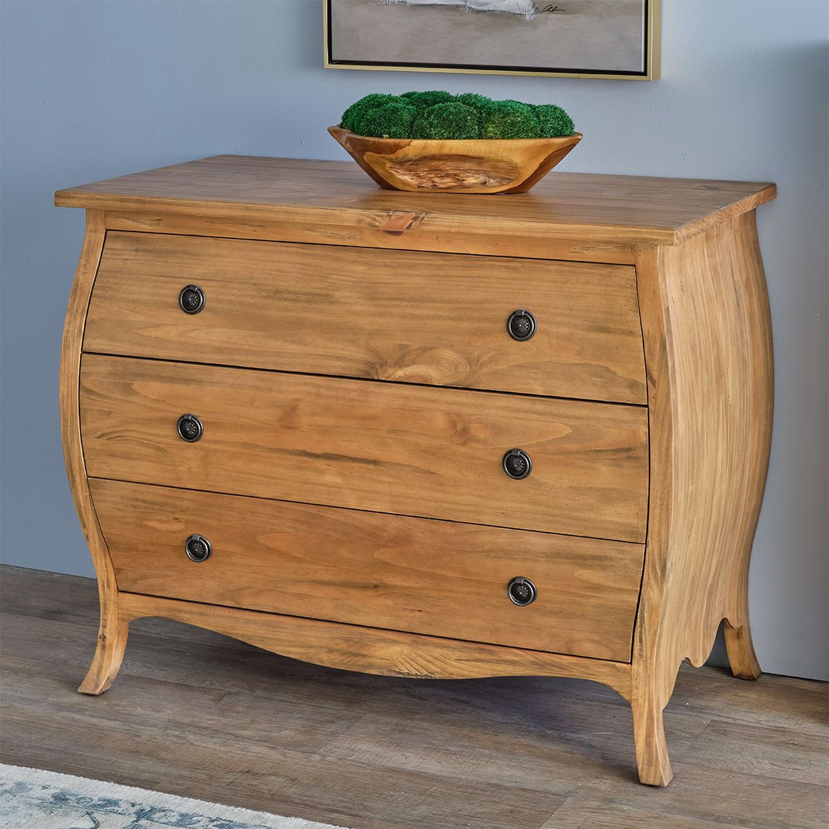 A Caldana Cabinet with Natural Wood color