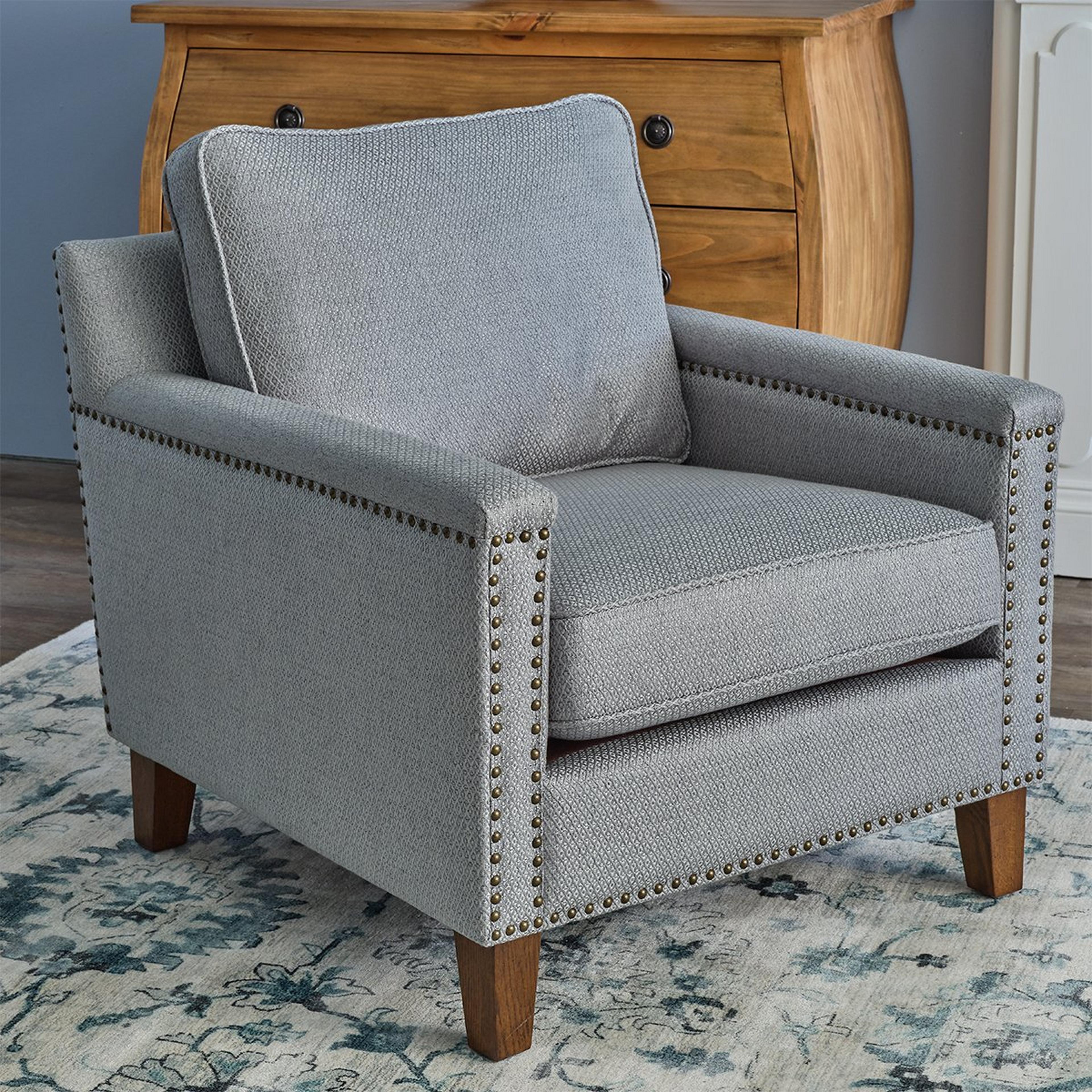 A Valdez Accent Chair with Light Blue / Dark Wood color