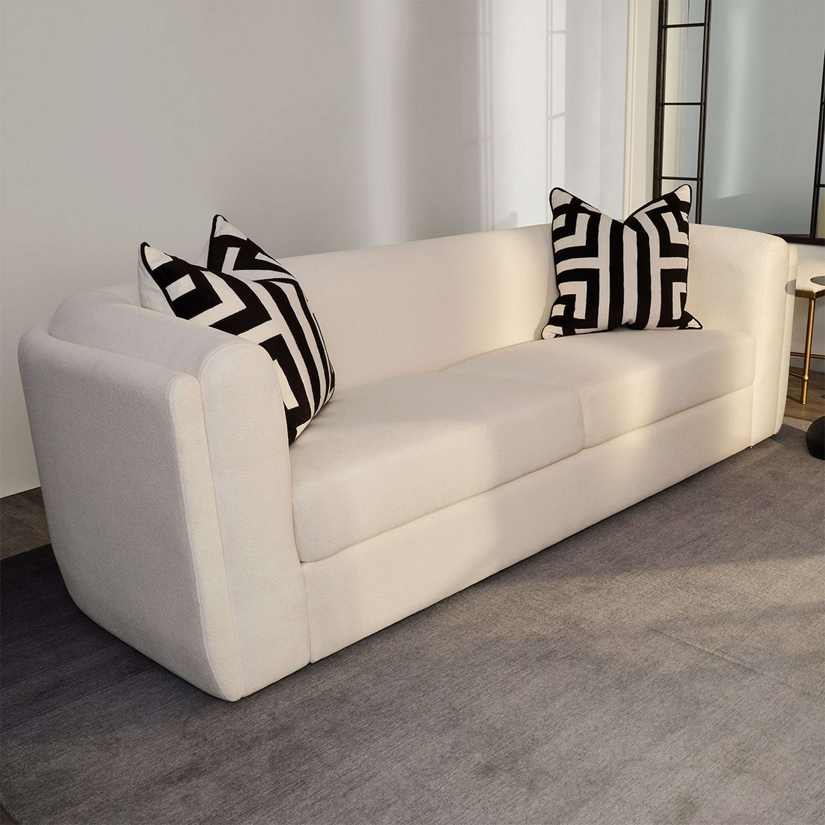 A Mikey Sofa with White Upholstery color