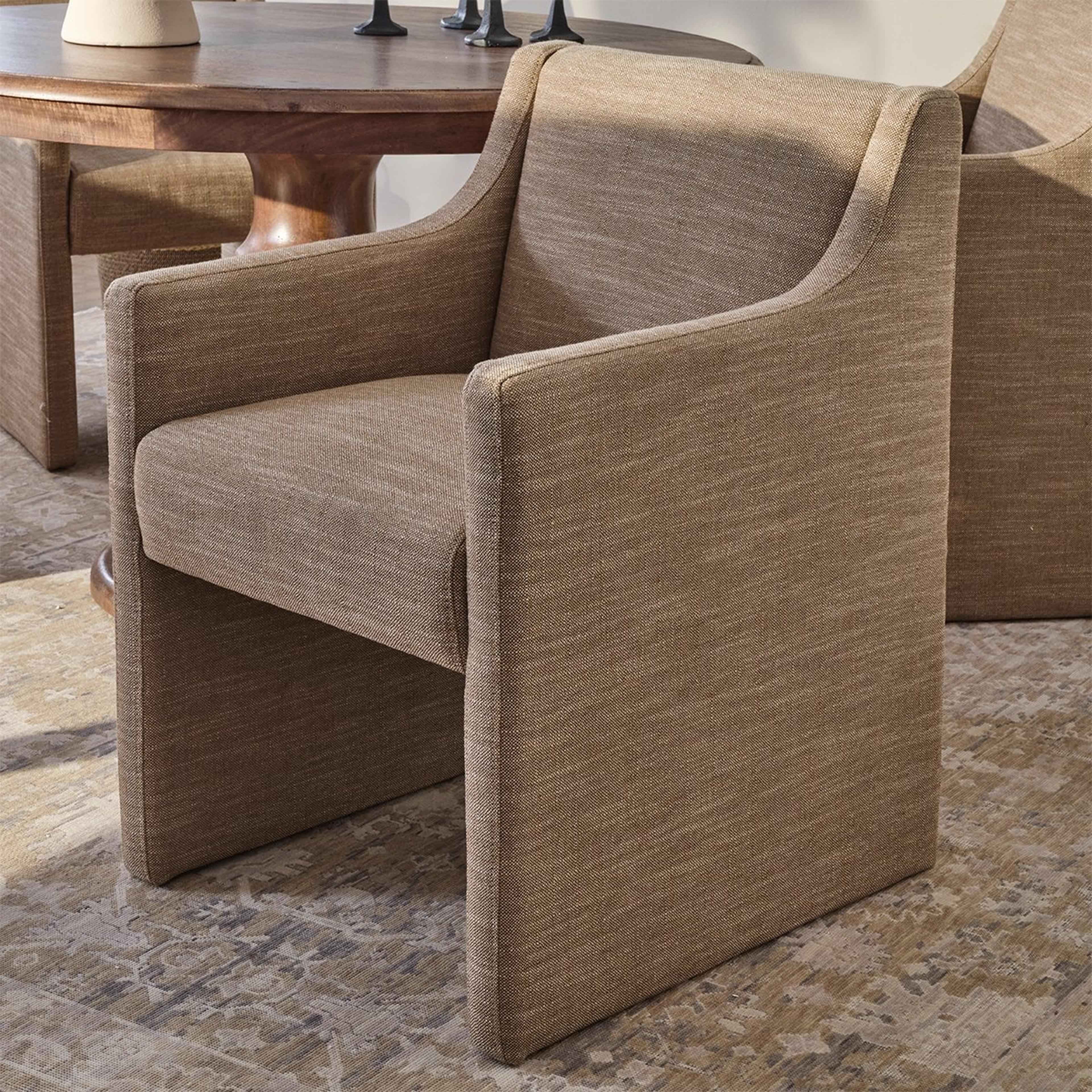 A Jedo Upholstered Dining Chair with Camel color