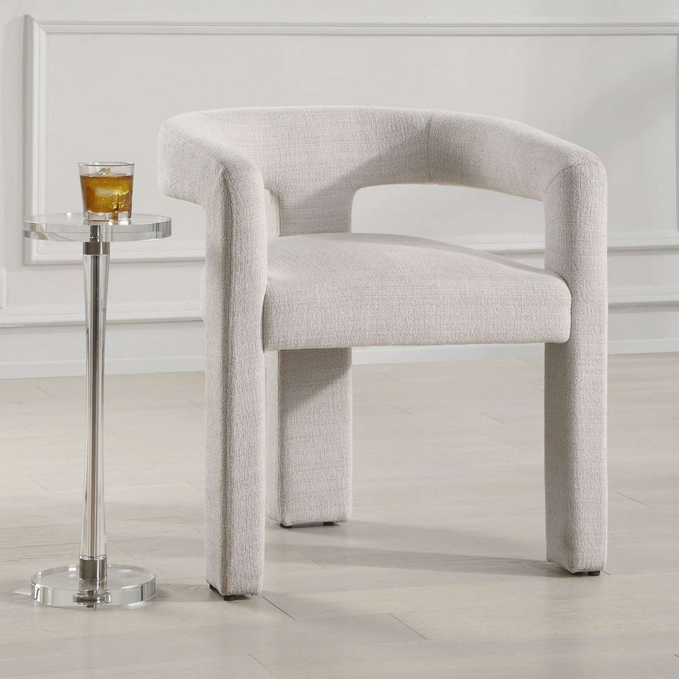 A Kamran Dining Chair with White Upholstery color