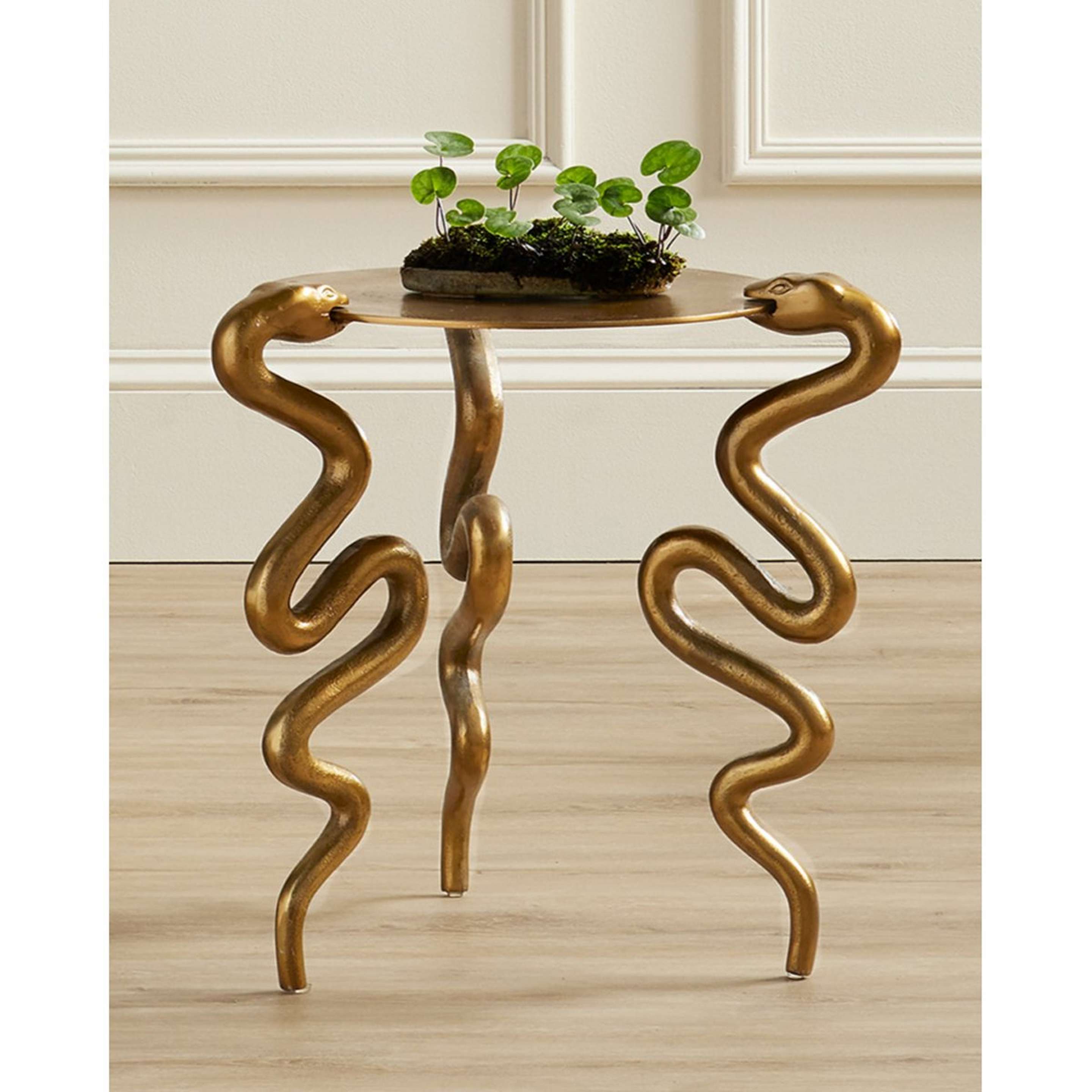 A Tiresias End Table with Aged Brass color