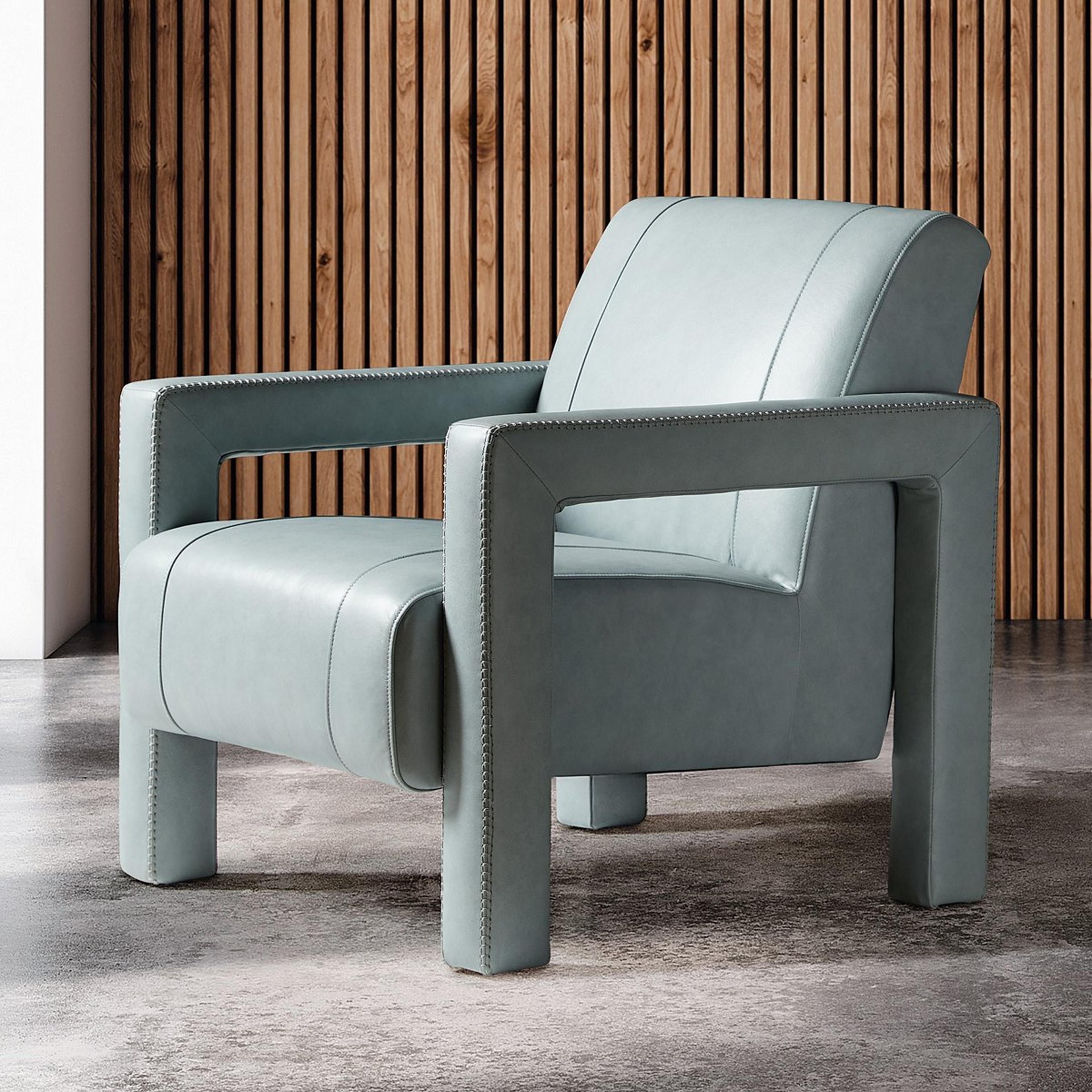 A Cipriano Accent Chair with Light Blue Leather color