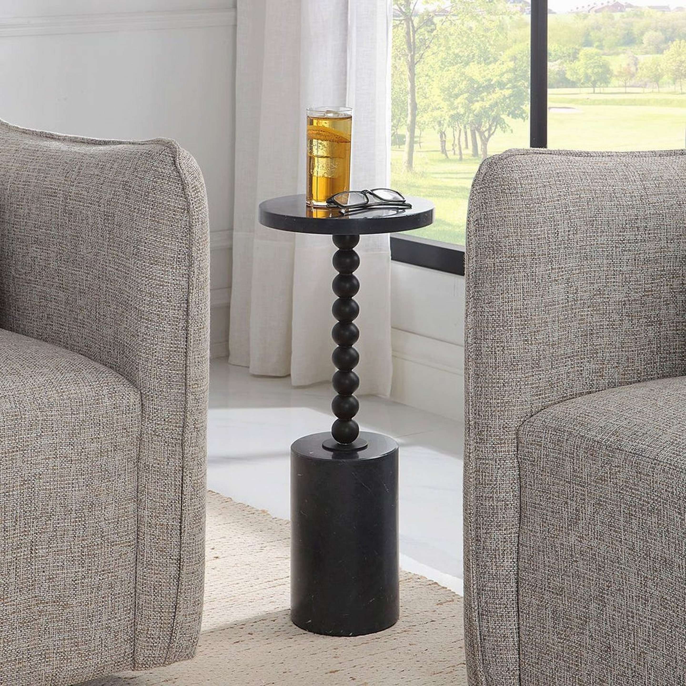A Engracia End Table with Black Marble color
